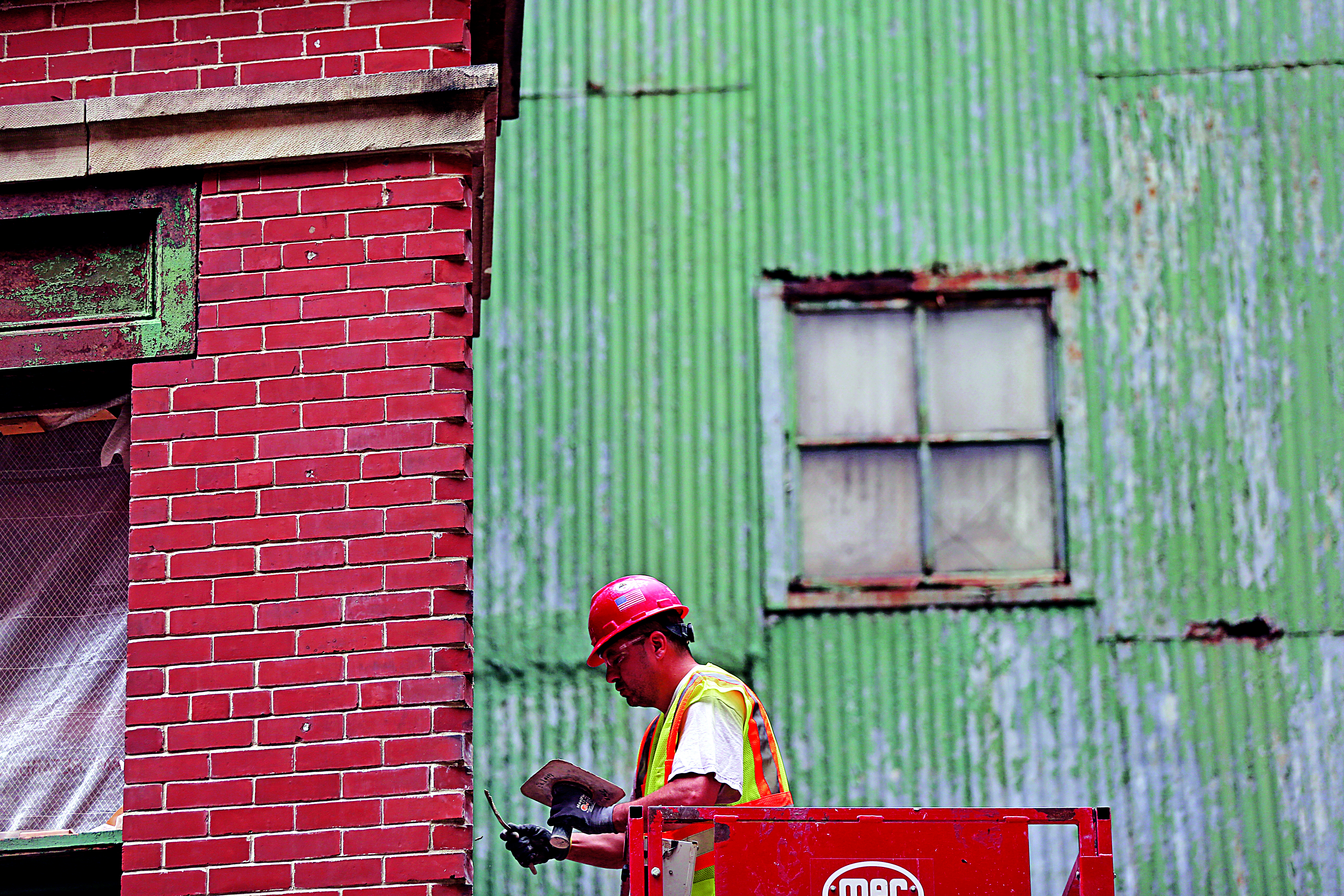 Crews restored the exterior brickwork at GE’s future home.