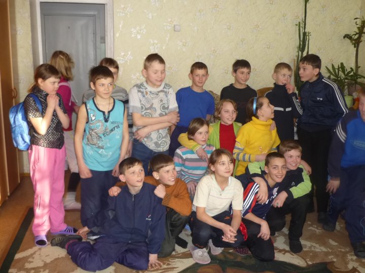Roman (second from right, bottom row), with other children at a detsky dom.