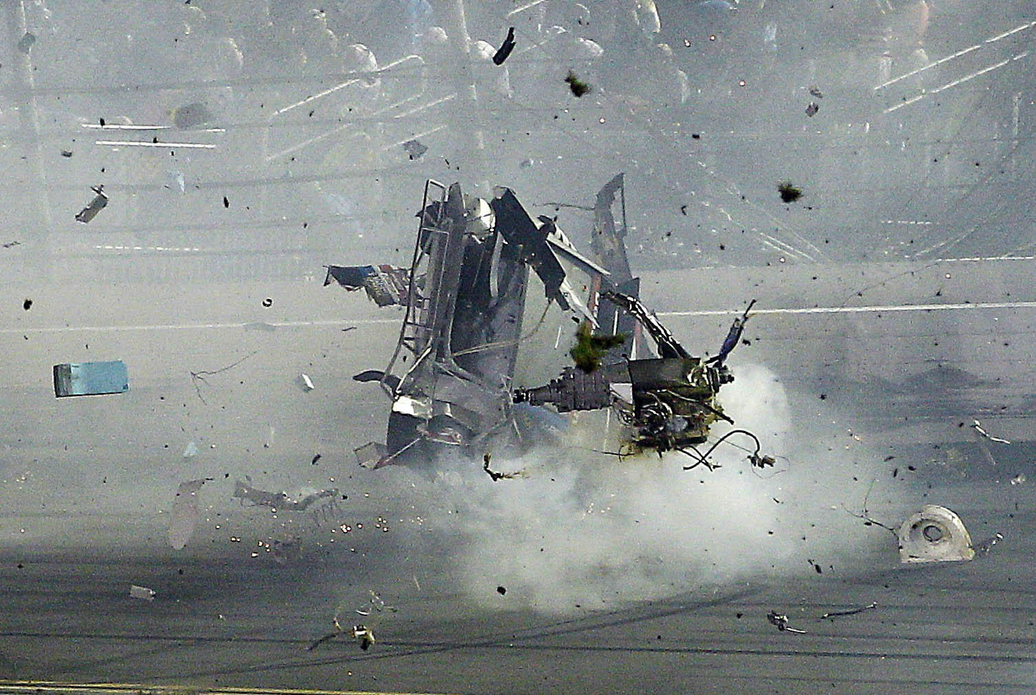 Parts flew off Dillon’s car as it traveled through the infield after hitting the fence.