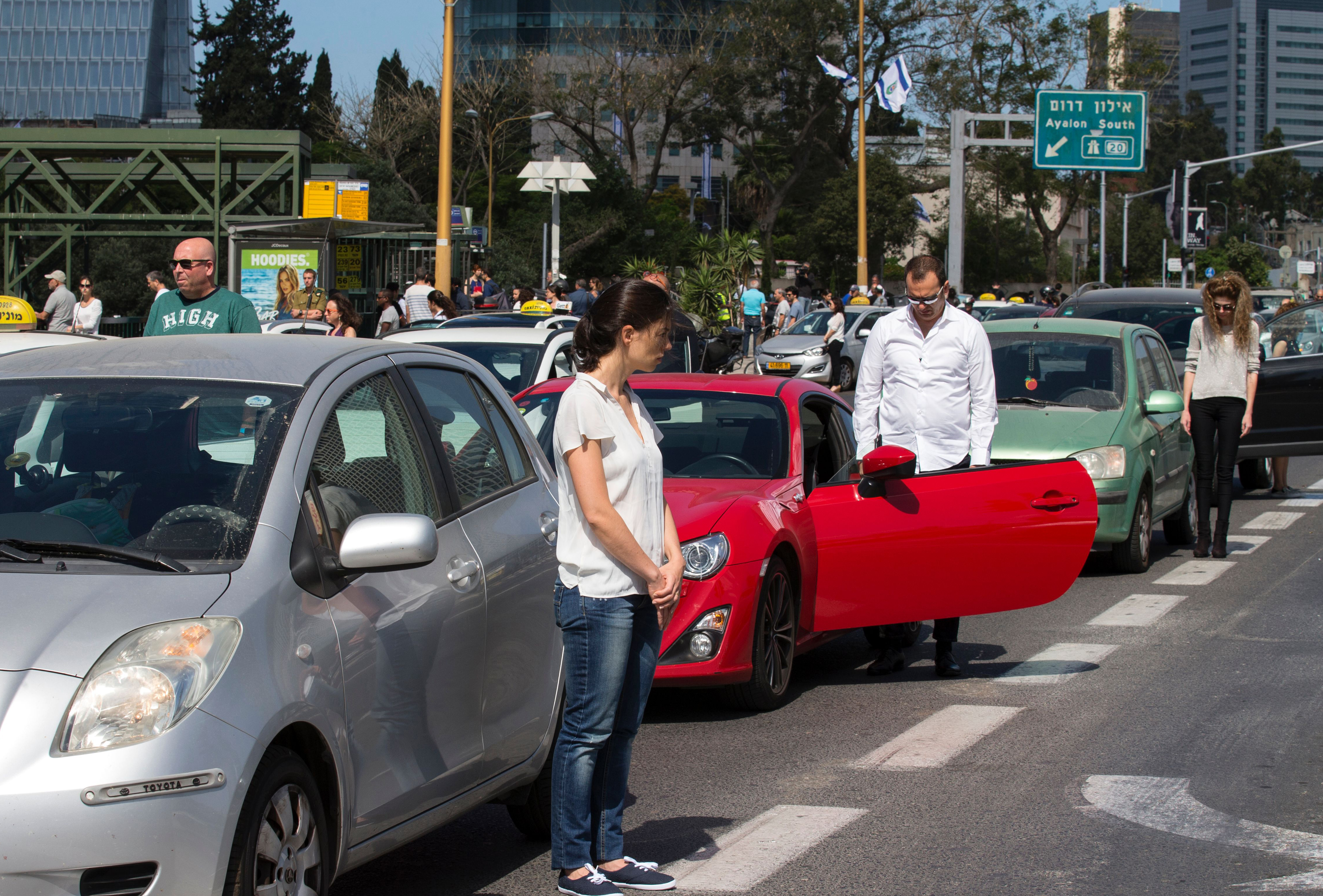 People stopped and stood in silence on a highway in Tel Aviv in May.
