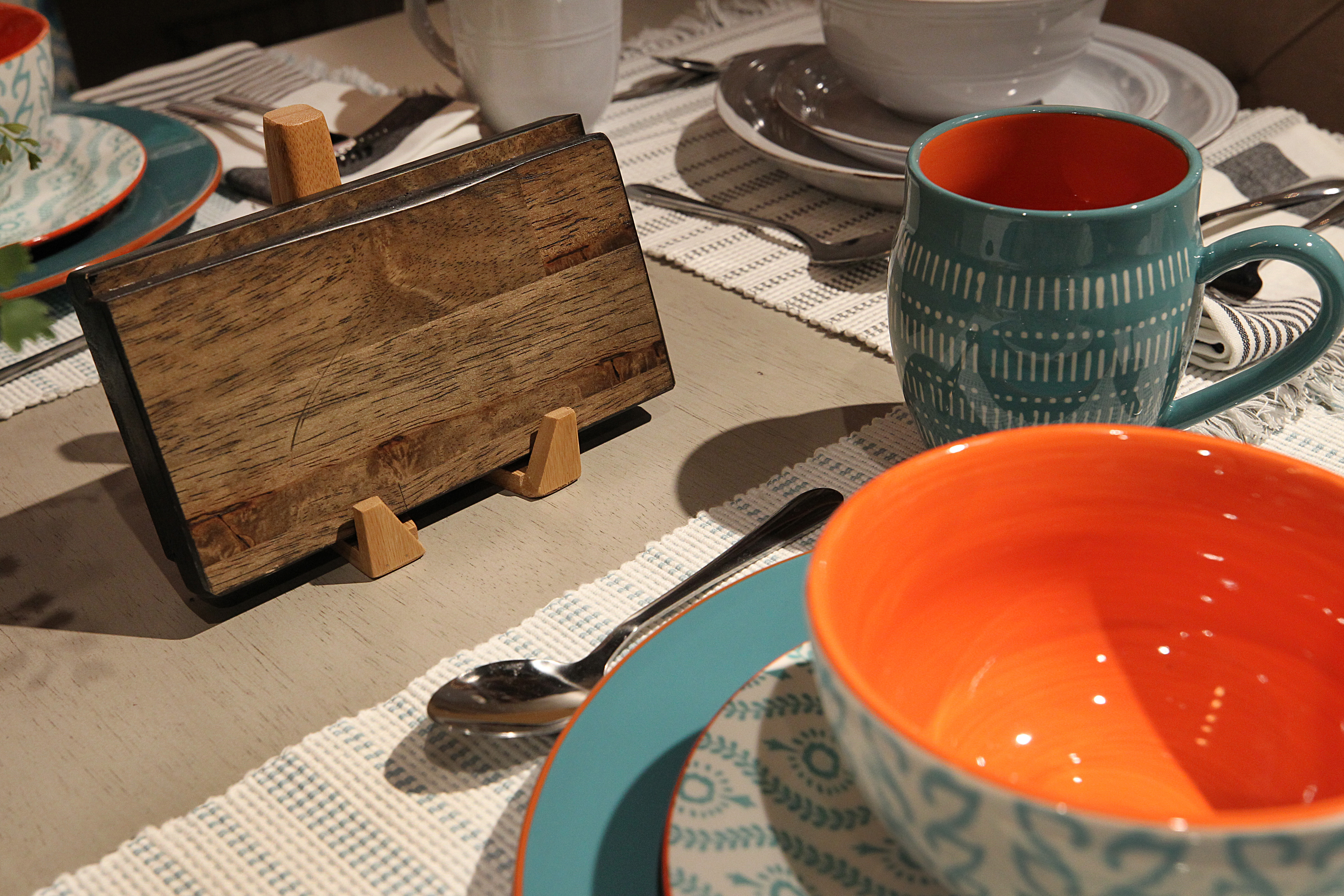 Samples of different finishes are placed on tables for sale.