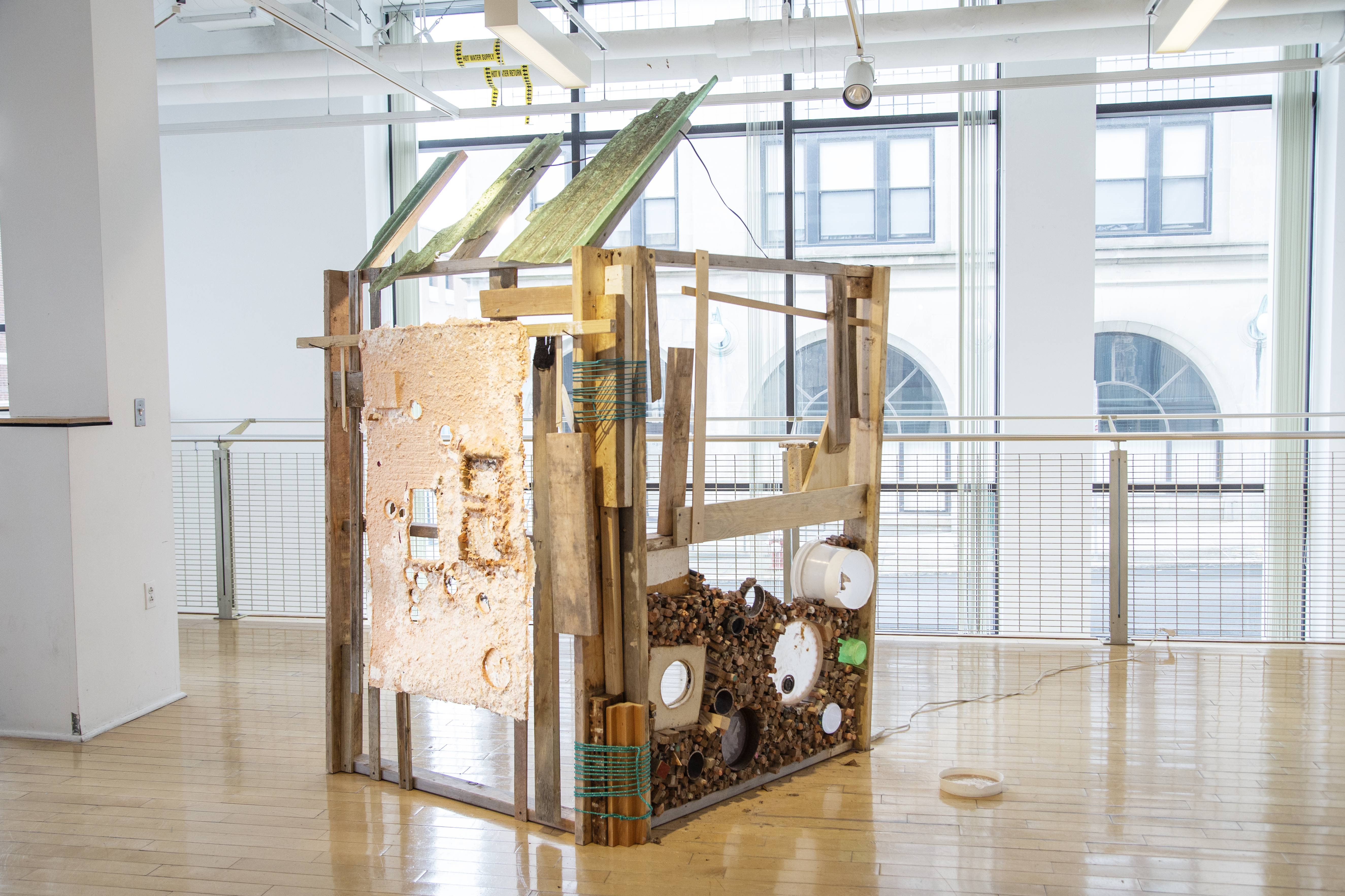 Jasmine Gonzalez builds vessels and house shapes from clay and fills them with materials that resonate with memories.