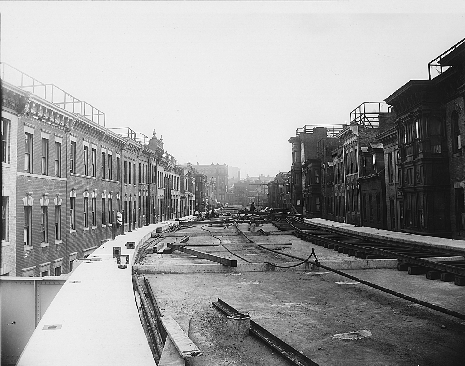 During construction of the West End’s elevated railway in September 1911 along what was then called Lowell Street, No. 42 was on the left, about midway down to Causeway Street, in this archival view.