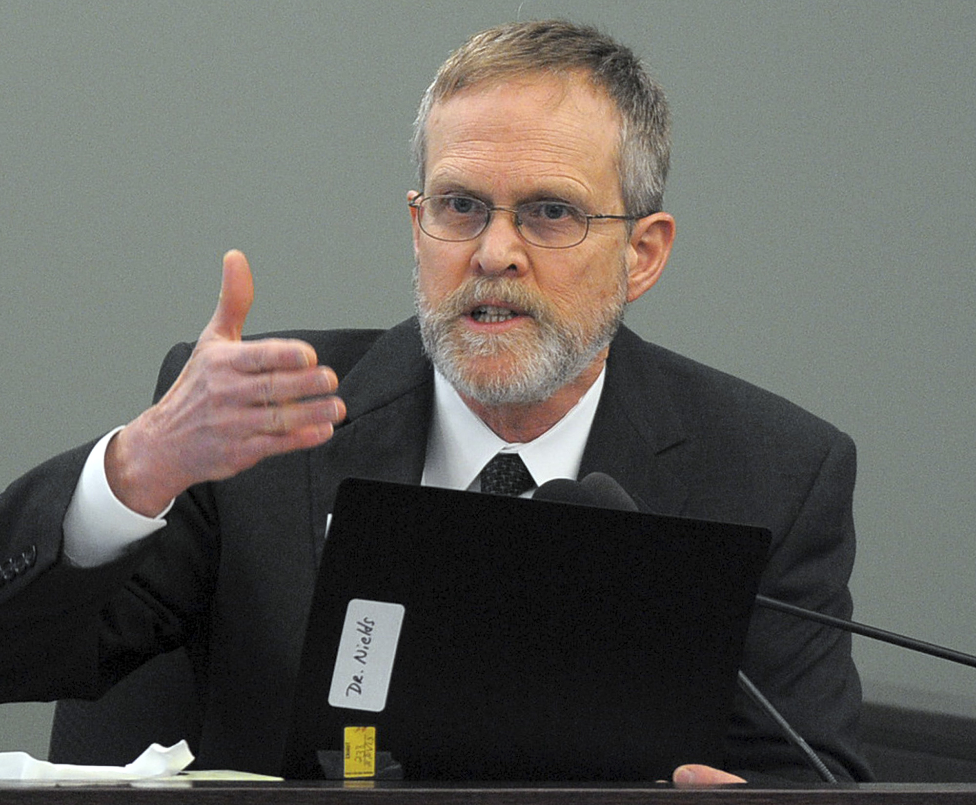 State medical examiner Henry Nields testified during Nathaniel Fujita’s murder trial in 2013.