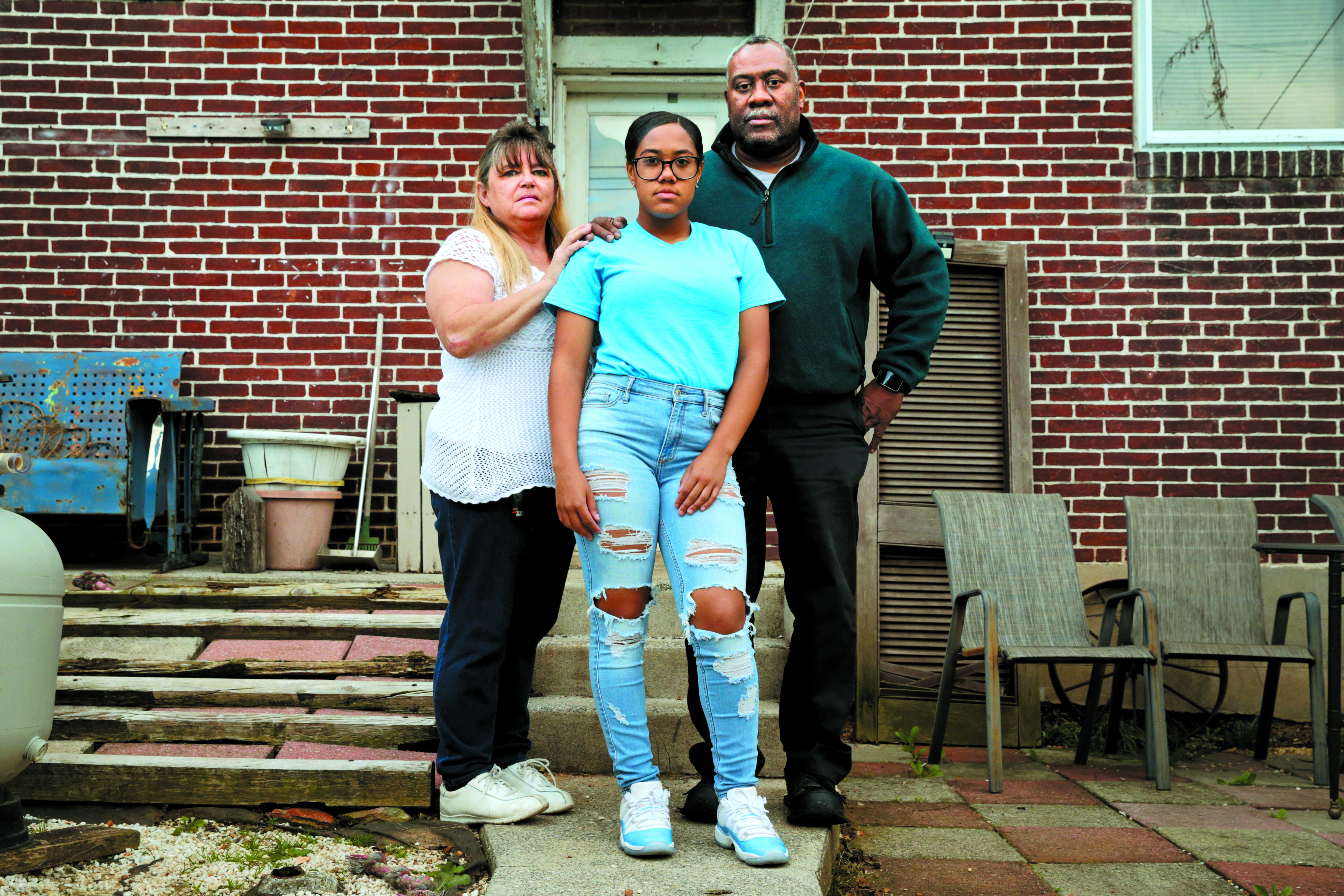 Nylaya Way (center), 16, a junior at York County School of Technology, with her parents, Barbara Estep and Steve Way, at their home in York.