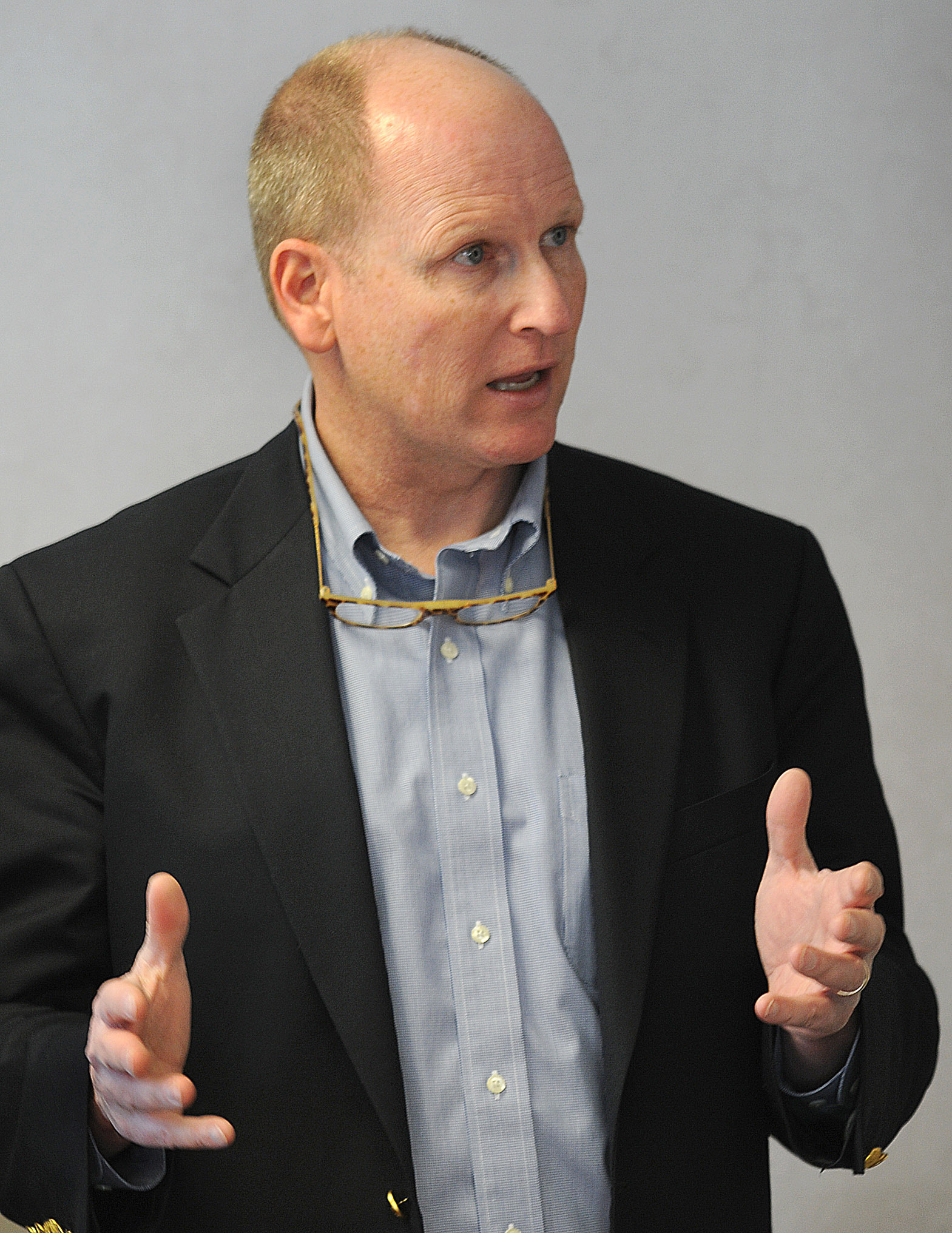 State Representative Dan Winslow talked with bank officials last March during a meeting at the Wrentham Co-operative Bank.