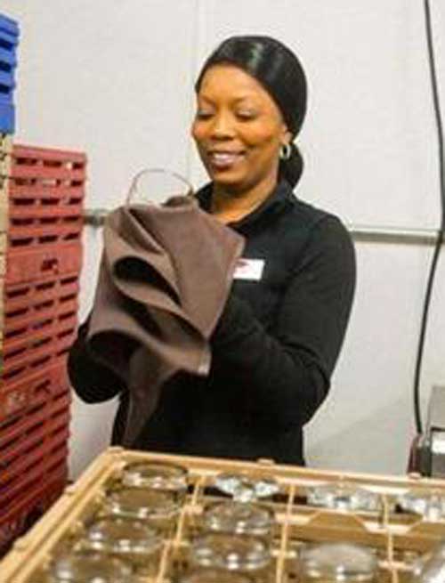 Natalee Harris cleaned drinking glasses at the Stratton Mountain Club.