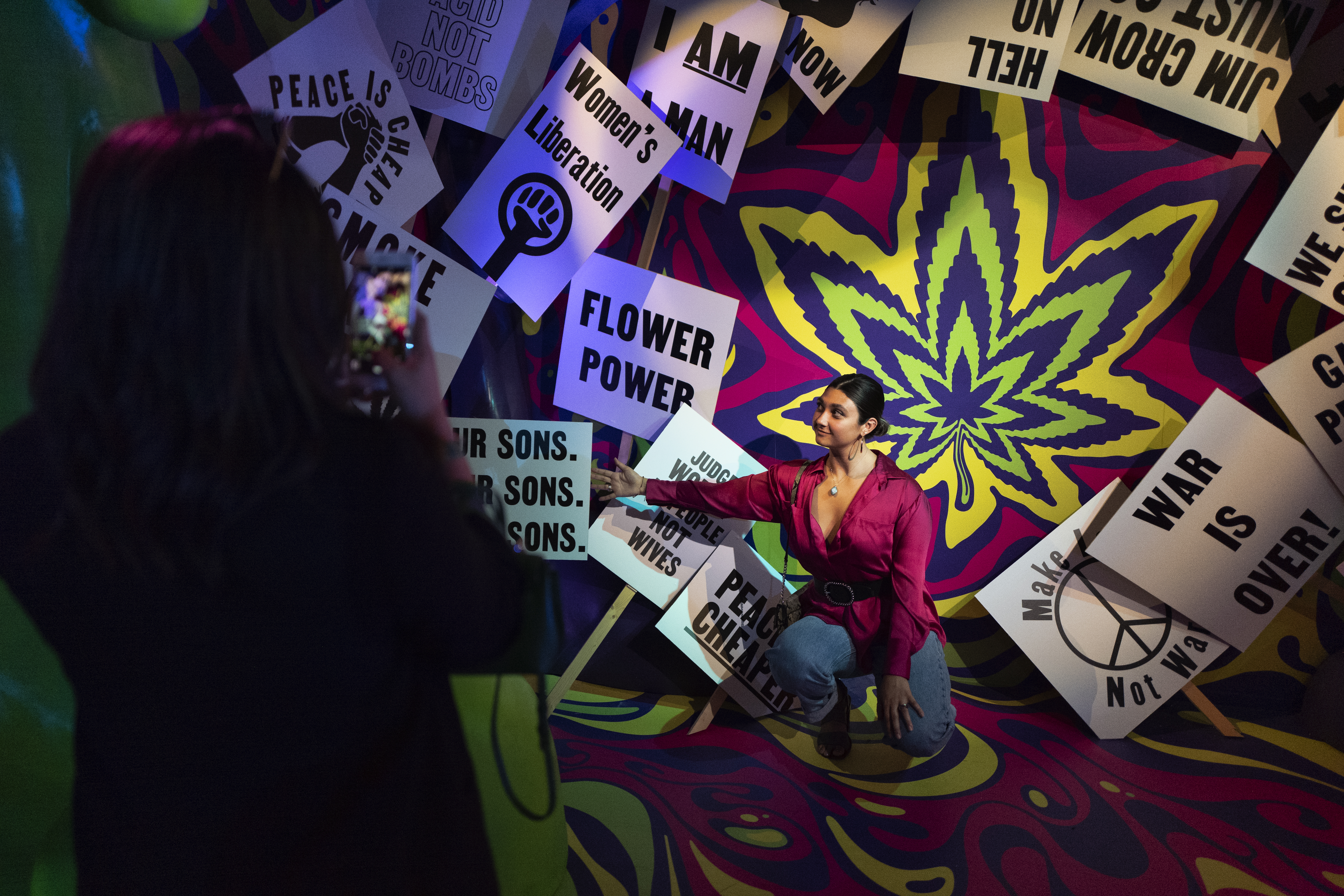 Visitors stop to take selfies while passing through one of the interactive displays.