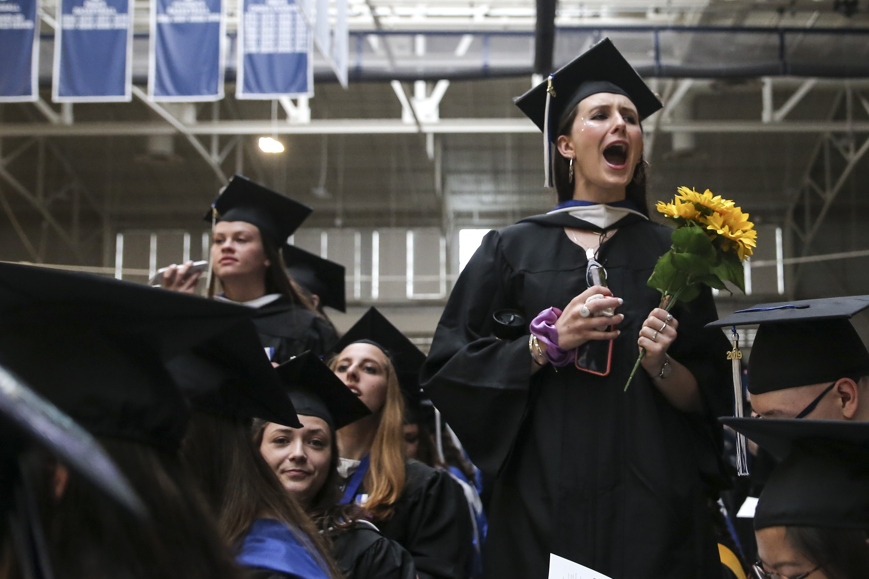 Gemma Curnin scanned the crowd for friends and family before the ceremony.