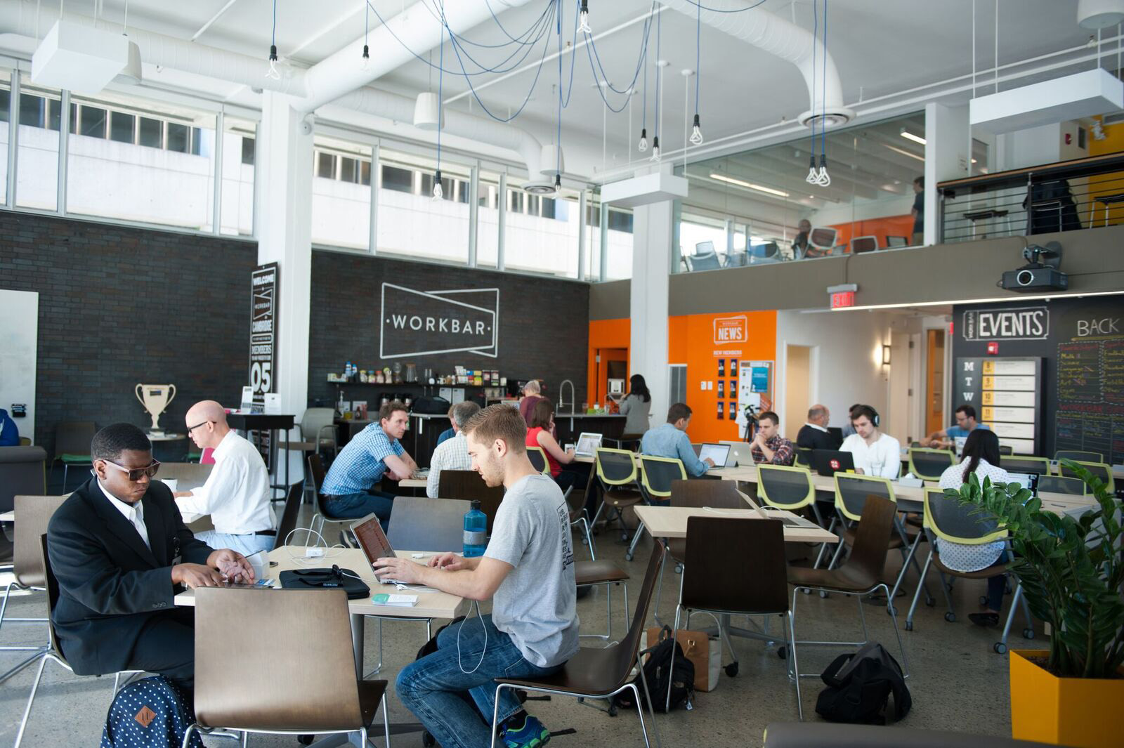 Workbar, a co-working upstart that serves a new class of workers not tethered to traditional offices, will soon appear in three Staples stores. Above: Workbar’s Cambridge location.
