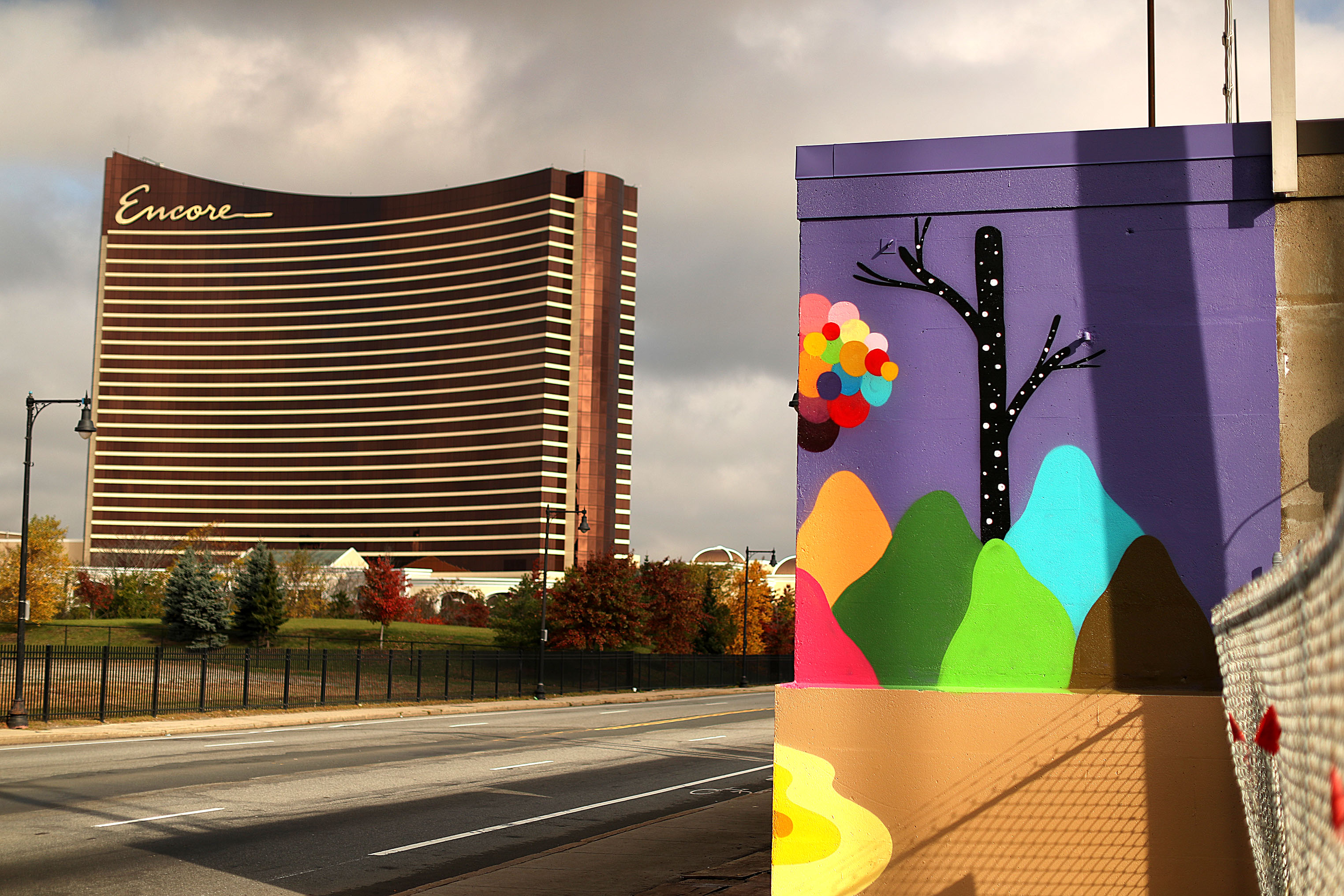 Artist Okuda San Miguel’s mural near the Encore Boston Harbor casino.