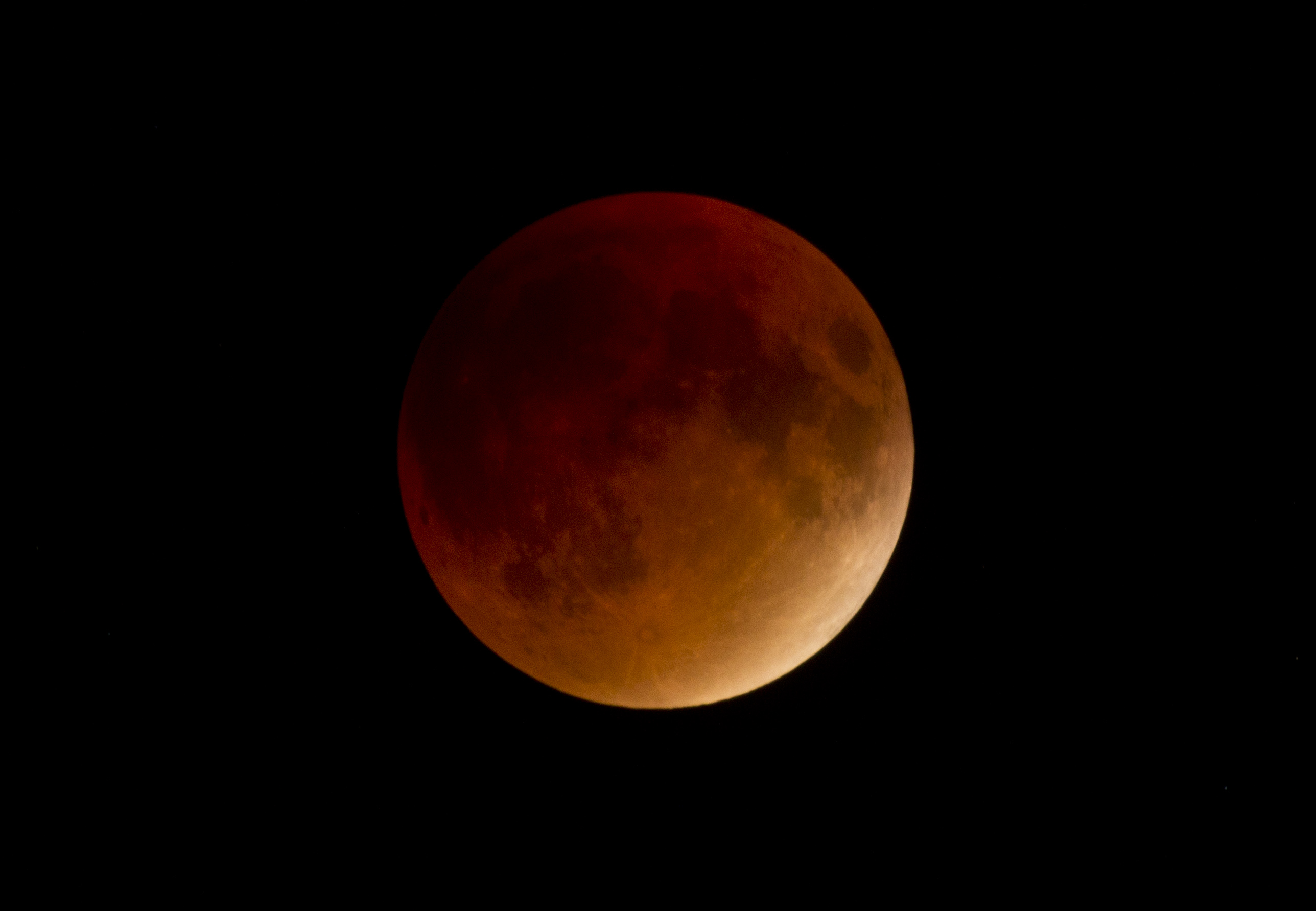 A supermoon combined with a total lunar eclipse, as seen from Medford. The events will not happen together again until 2033.