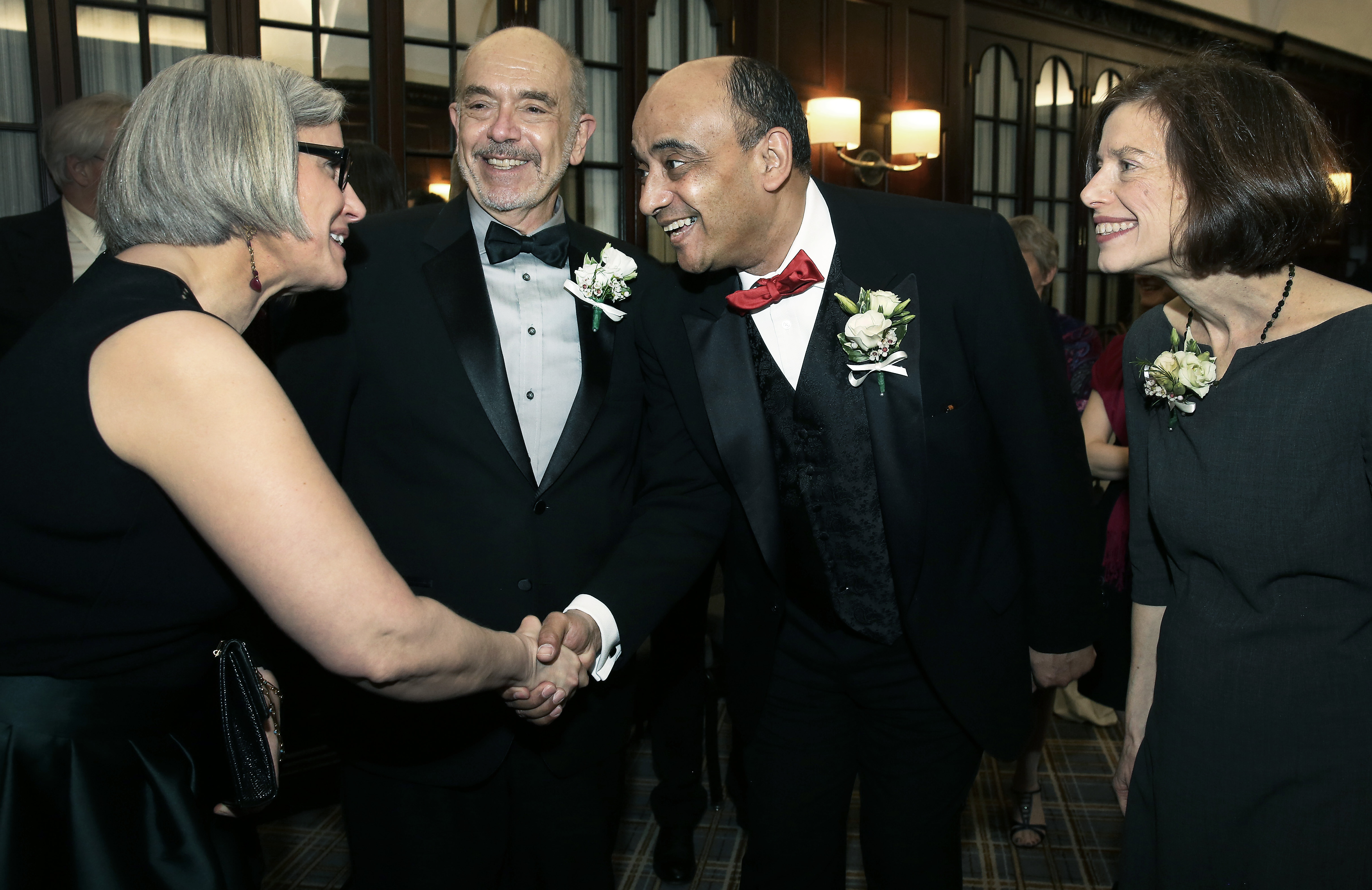 Authors and honorees Jane Kamensky, left, Wally Lamb, Kwame Anthony Appiah and Susan Faludi say hello at the the BPL’s Literary Lights awards dinner.