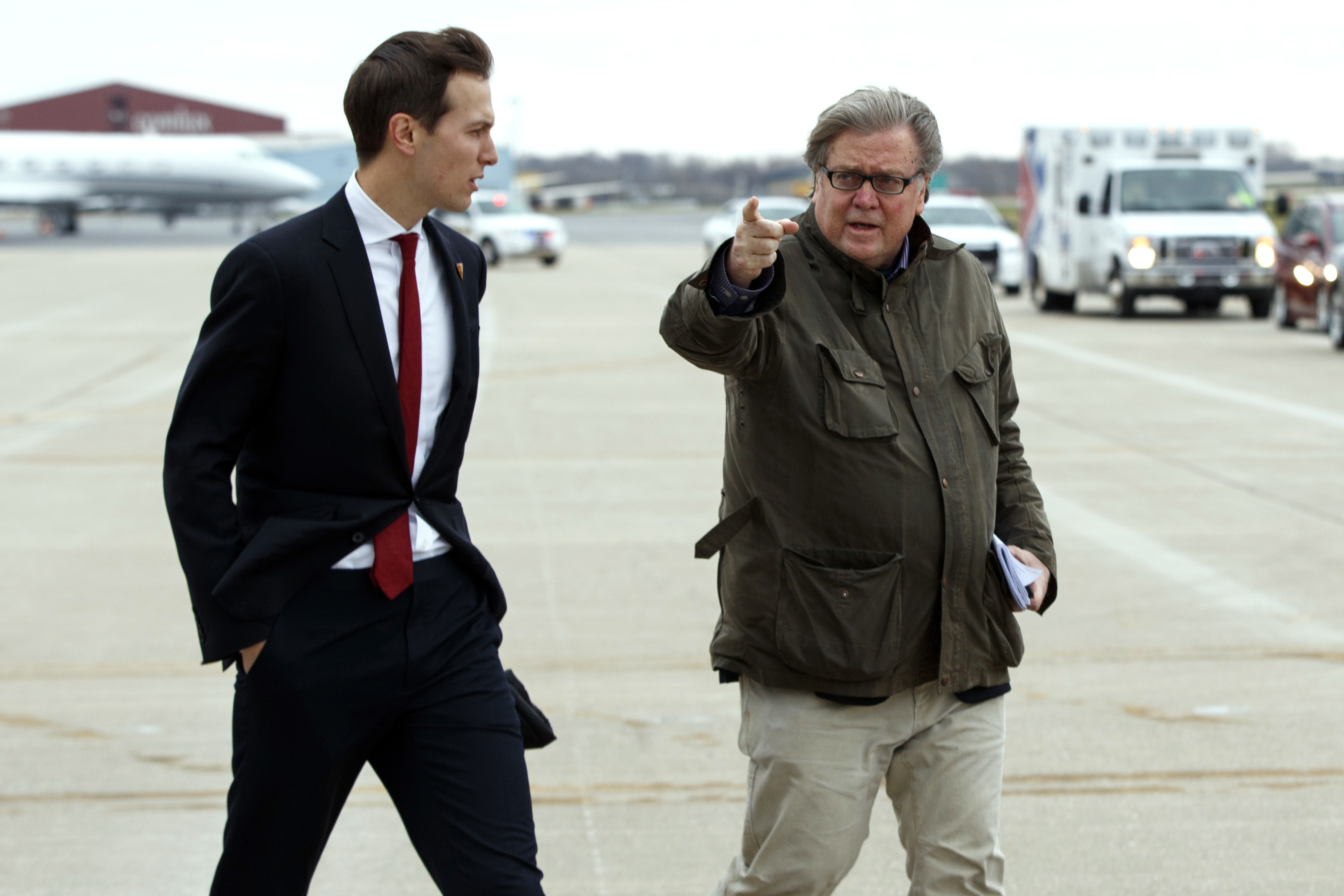 Jared Kushner (left), son in-law of President-elect Donald Trump, walked with Trump's chief strategist Steve Bannon at Indianapolis International Airport on Thursday.