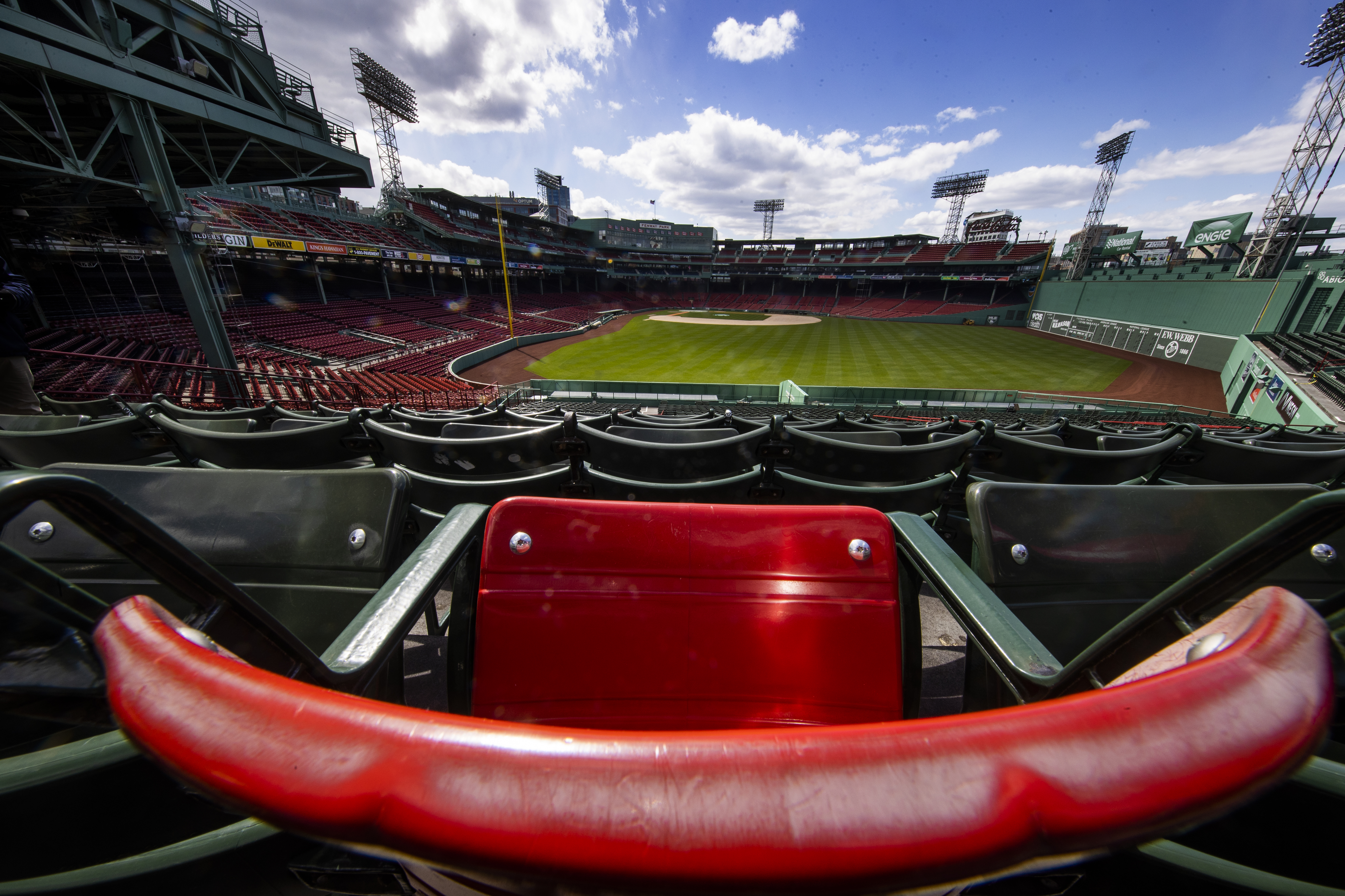 The red seat in section 42, row 37, seat 21 marks the spot where Ted Williams hit the longest Fenway Park home run.