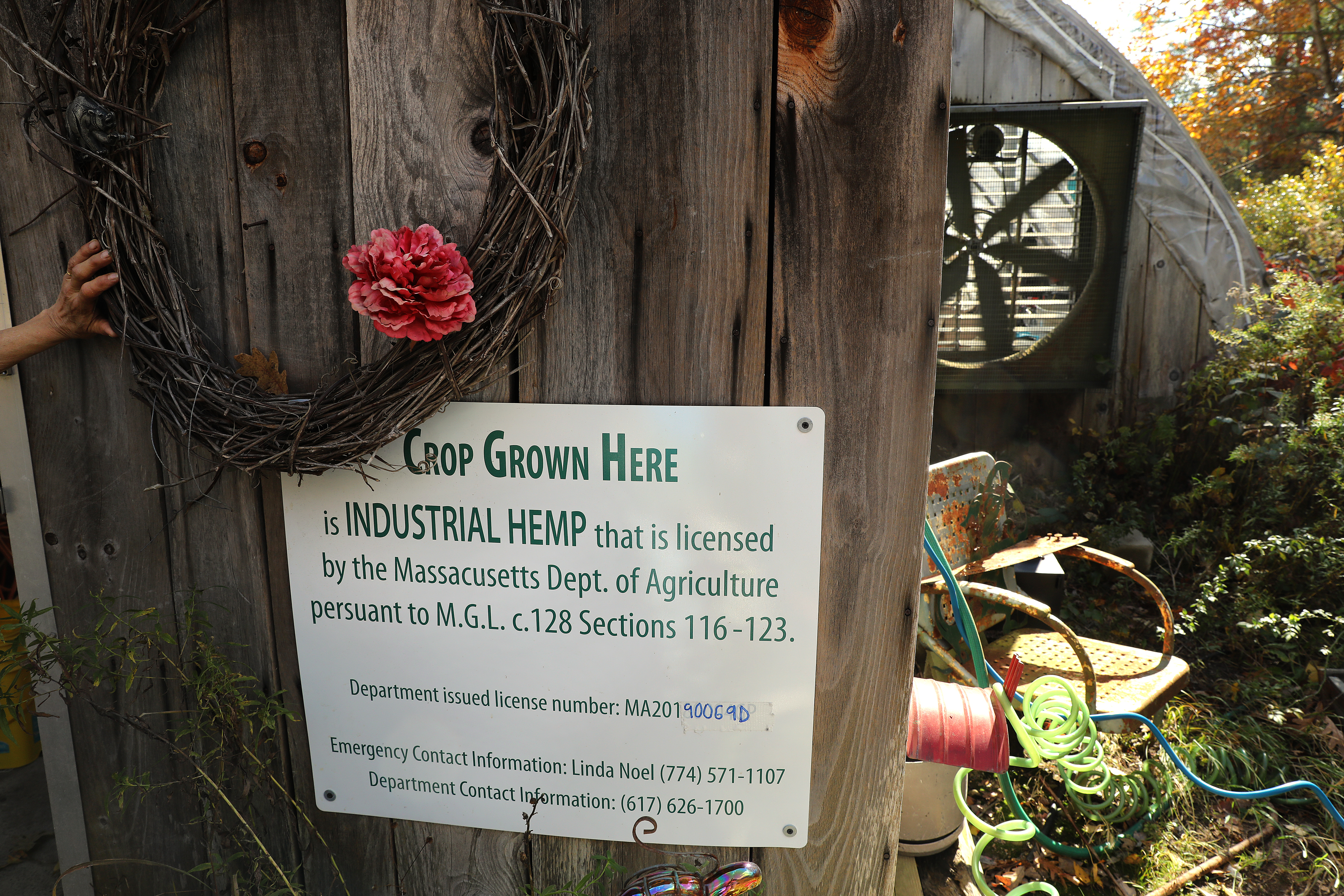 This sign is posted on the outside of Noel and Owens’s main greenhouse.