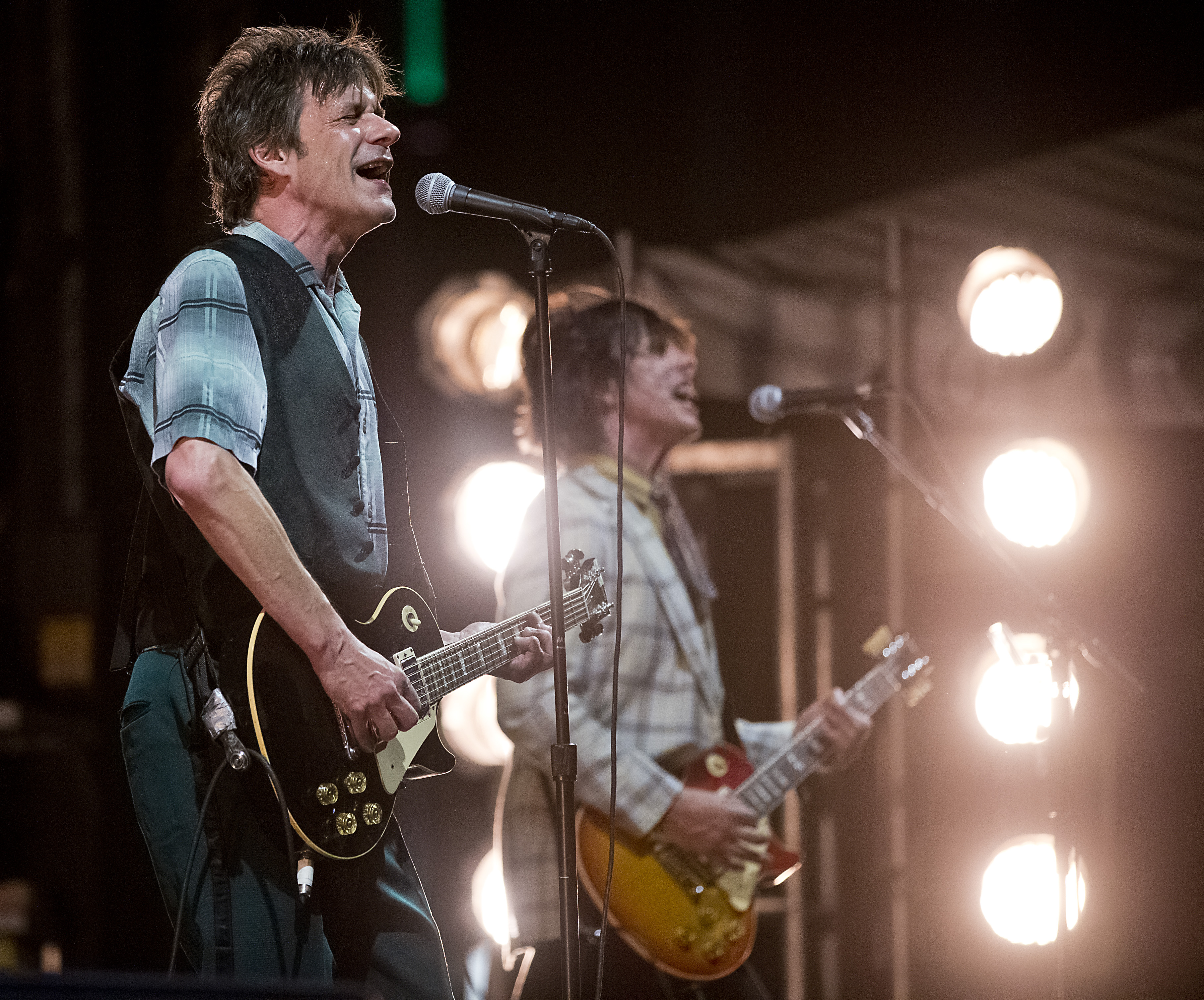 Paul Westerberg, left, and guitarist Dave Minehan perform during The Replacements’s set at the Boston Calling Music Festival at City Hall Plaza.