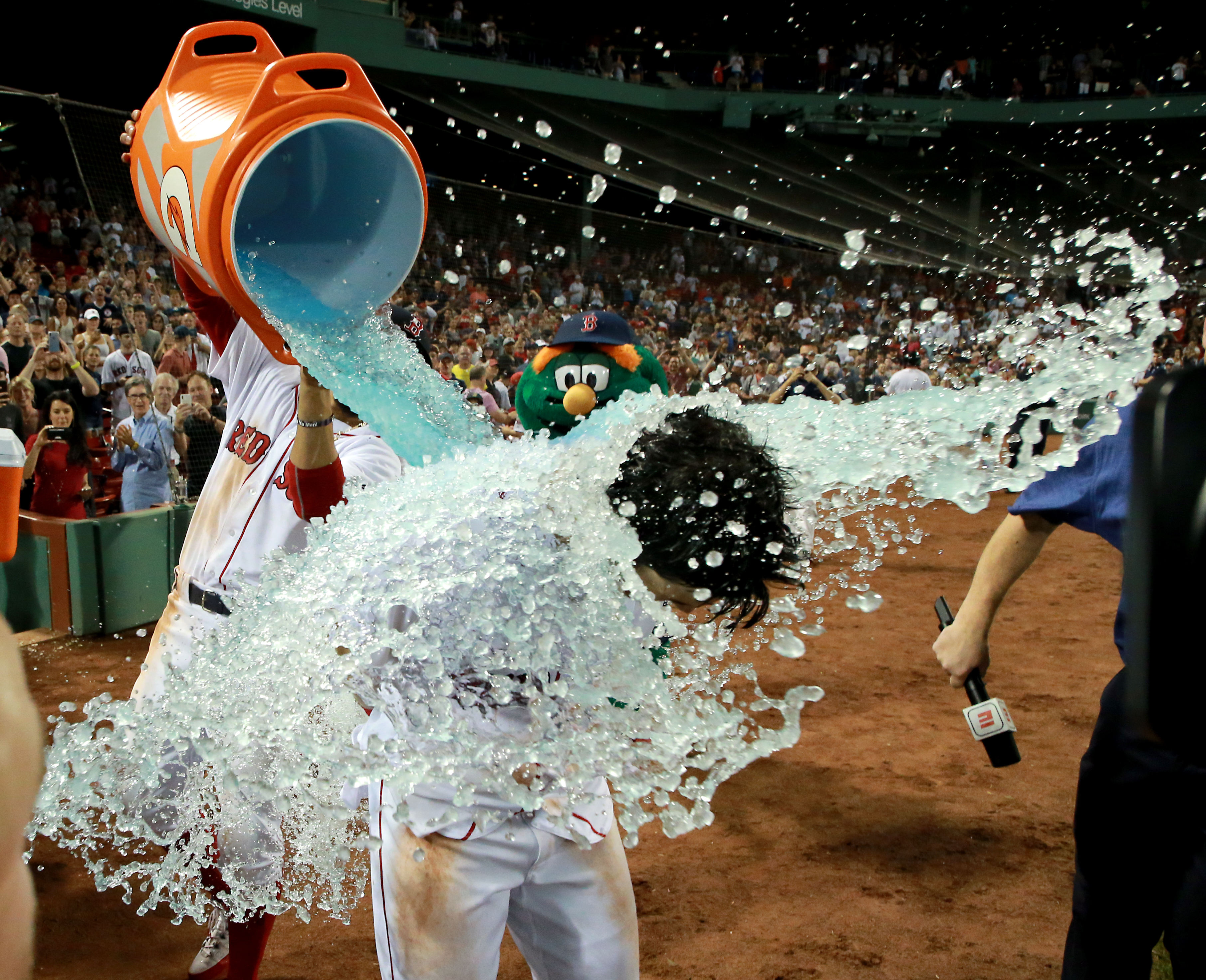 Which was followed by the customary Gatorade bath during the postgame TV interview . . .