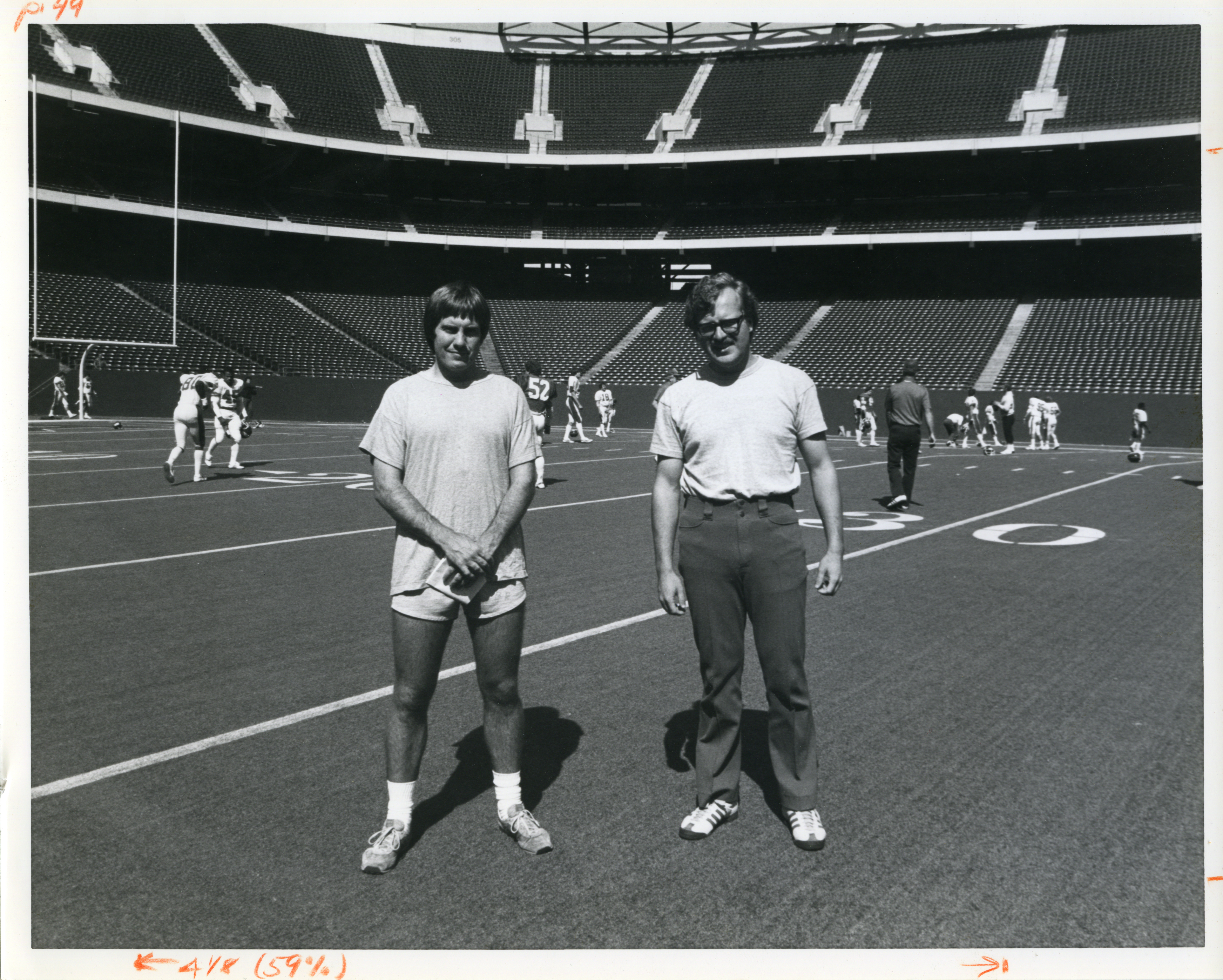 Bill Belichick (left) and Ernie Adams (right).