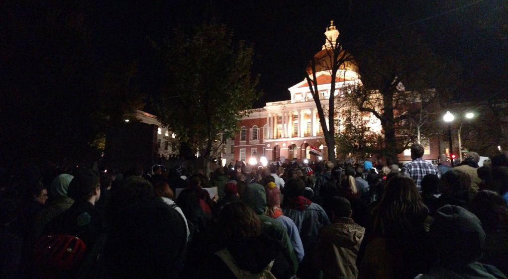 Protestors gathered at the State House in response to Gov. Baker’s comments regarding Syrian refugees.