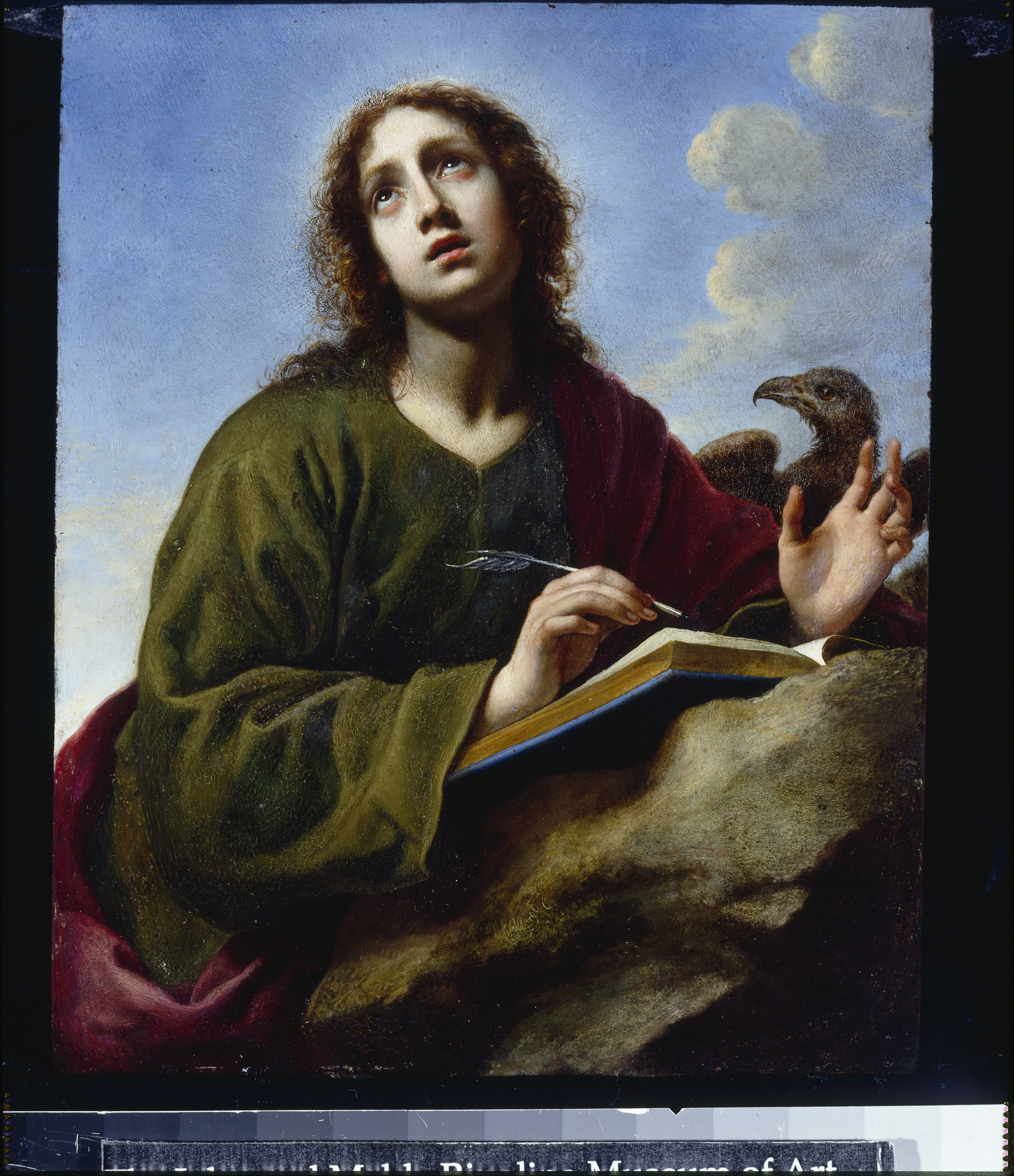 Carlo Dolci’s “Saint John the Evangelist Writing the Book of Revelation,” part of “The Medici’s Painter” at Wellesley College’s Davis Museum.