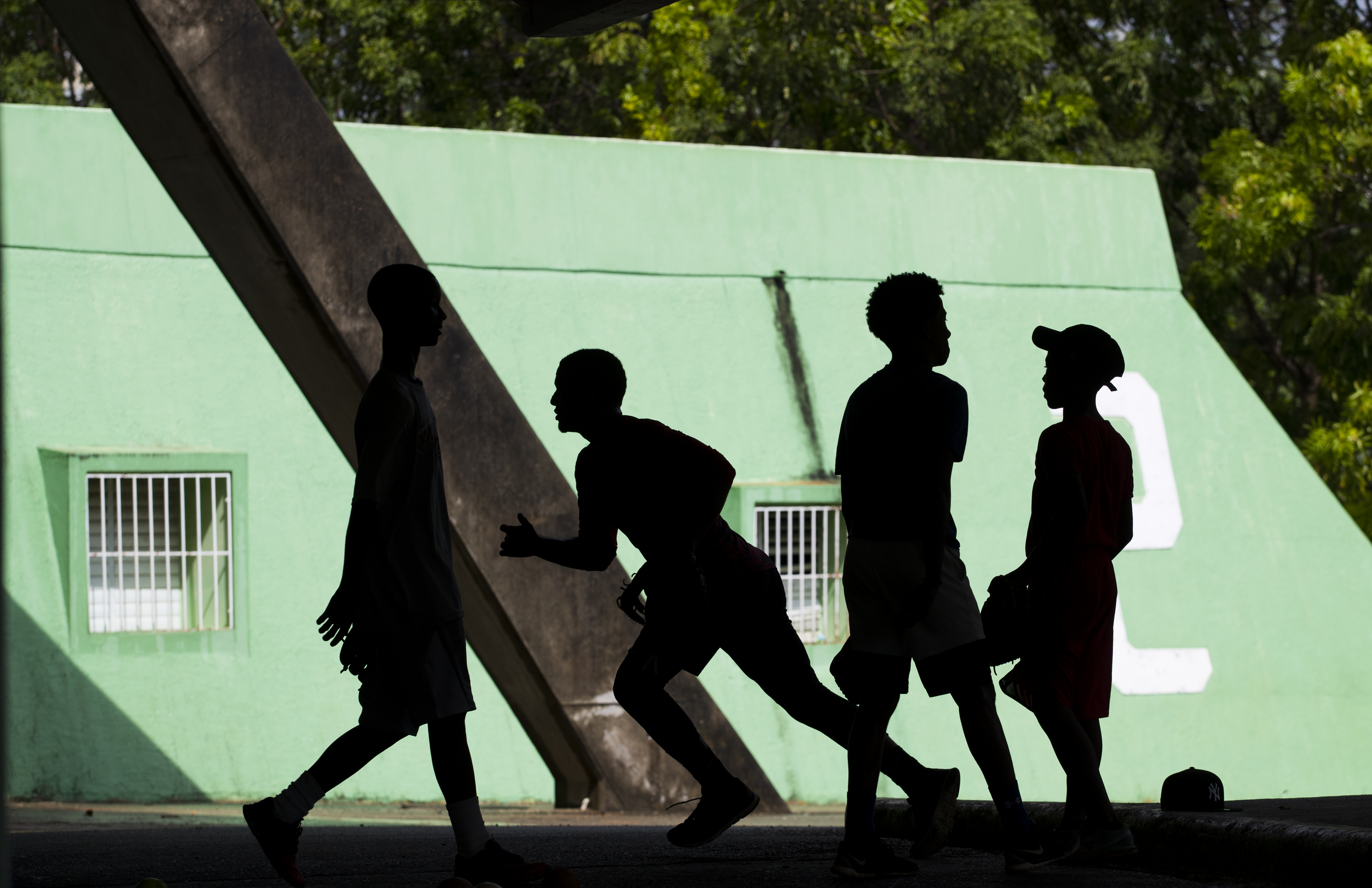 Young boys at Presinal’s training center. In the Dominican system, some boys as young as 10 turn to coaches and talent hunters for help securing professional contracts.