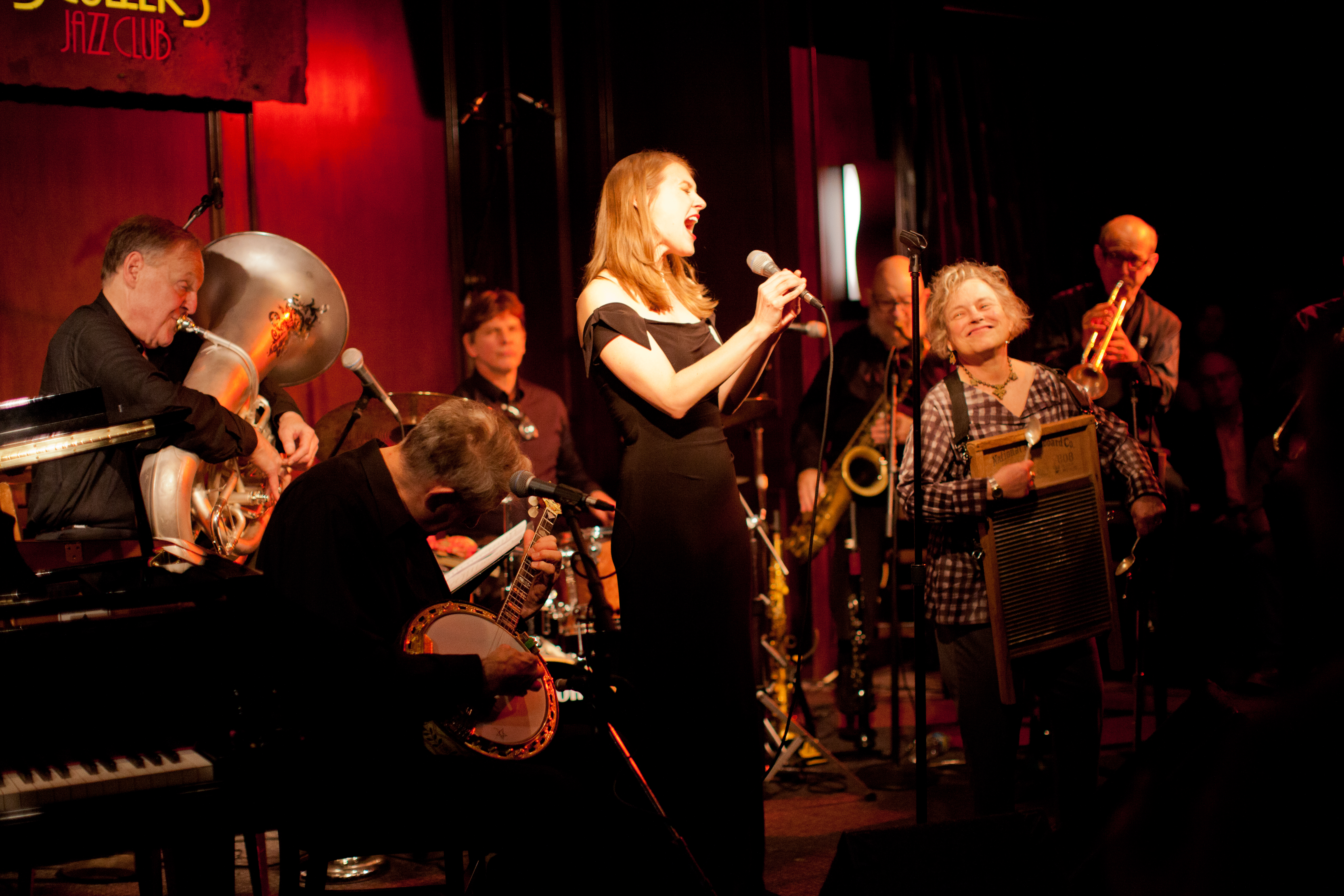 Dr. Eli Newberger (on tuba) plays with his wife, Carolyn (on washboard), and the rest of his band, Eli & the Hot Six, at a recent Scullers Jazz Club show.