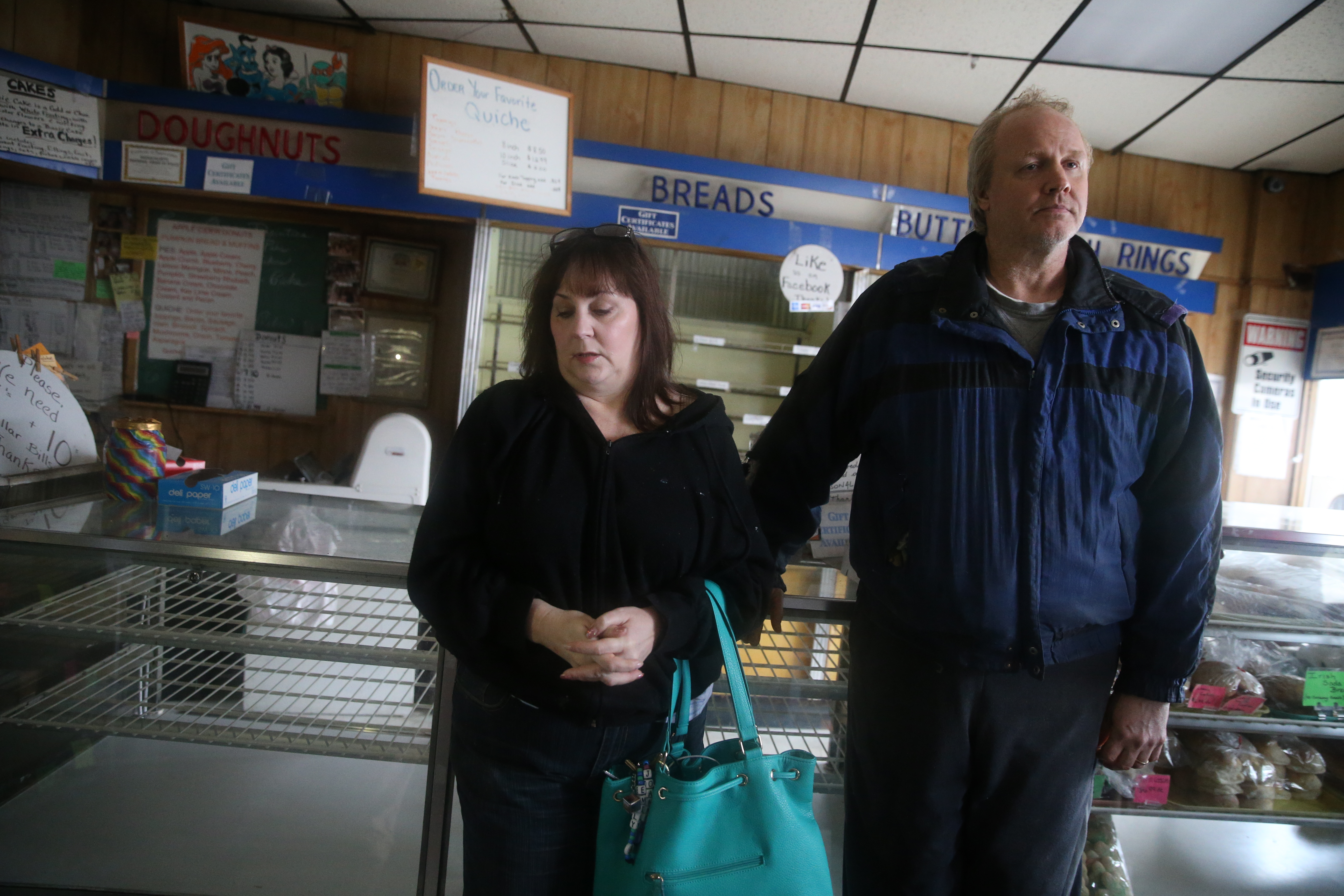 Marybeth Klemm (left) and her husband, Paul, looked relieved after he survived an explosion in the family’s bakery Tuesday.