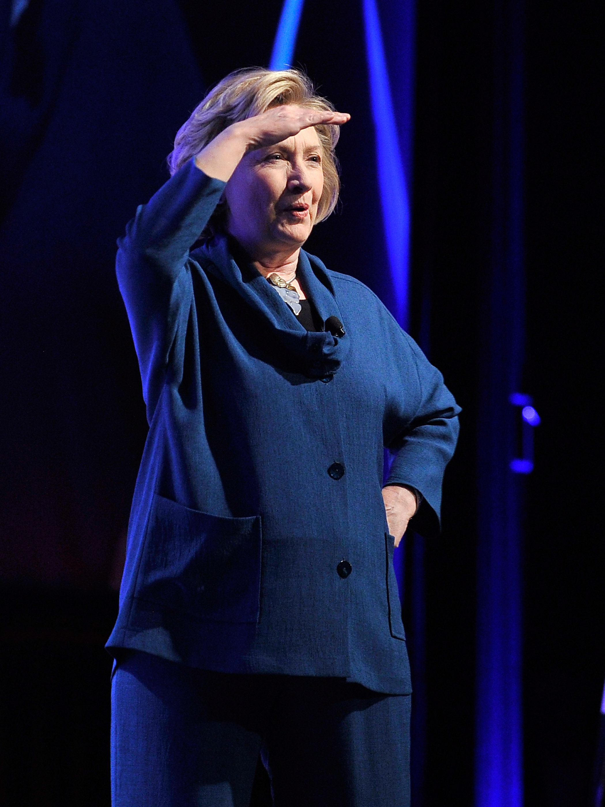 Clinton looked into the audience after the she was thrown.