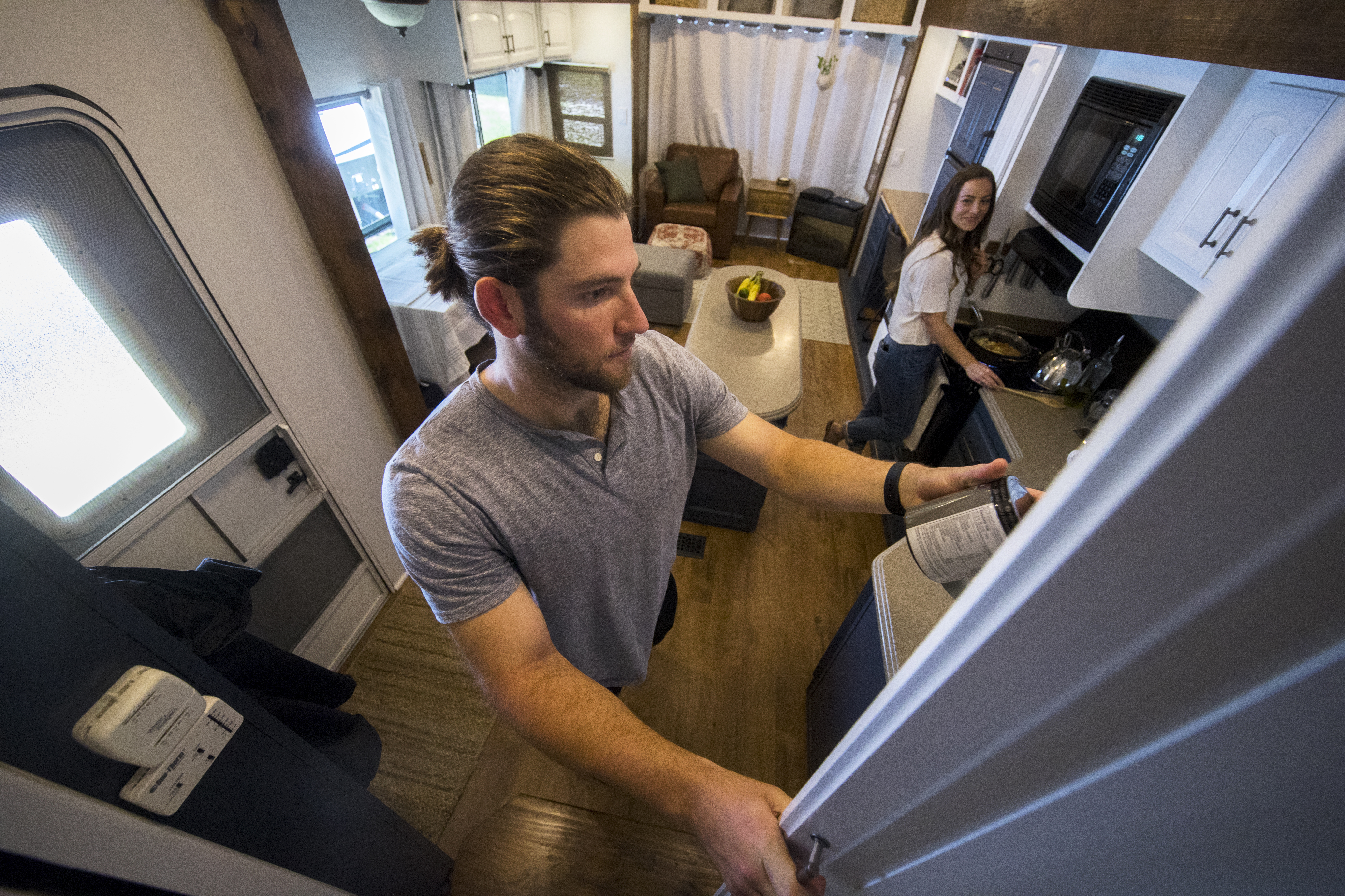 The Laus never have to pack when they move to a new destination.