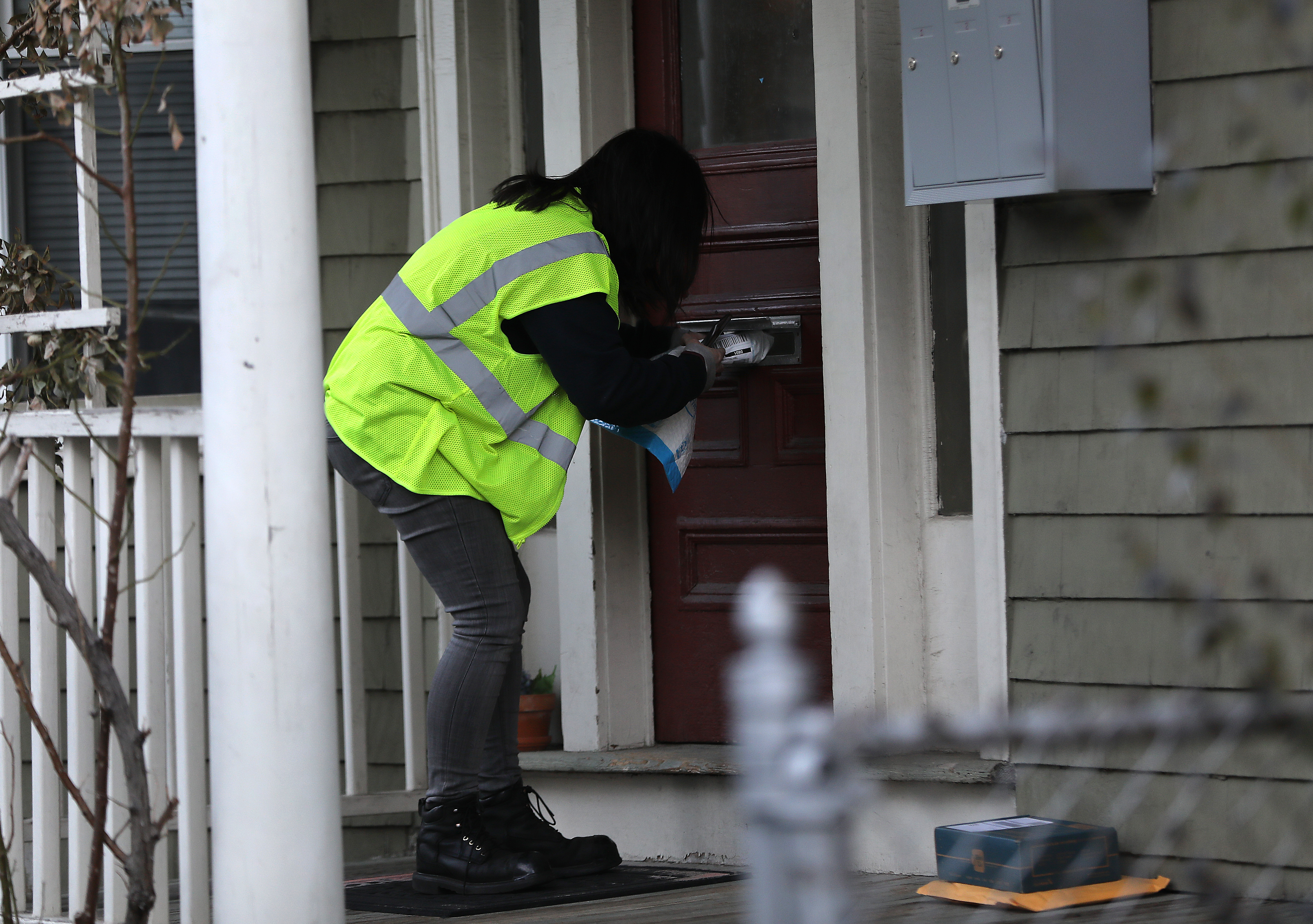 After picking up packages from the Amazon Fulfillment center in Everett, Amazon Flex driver Arielle McCain, 24, delivered them in Cambridge.