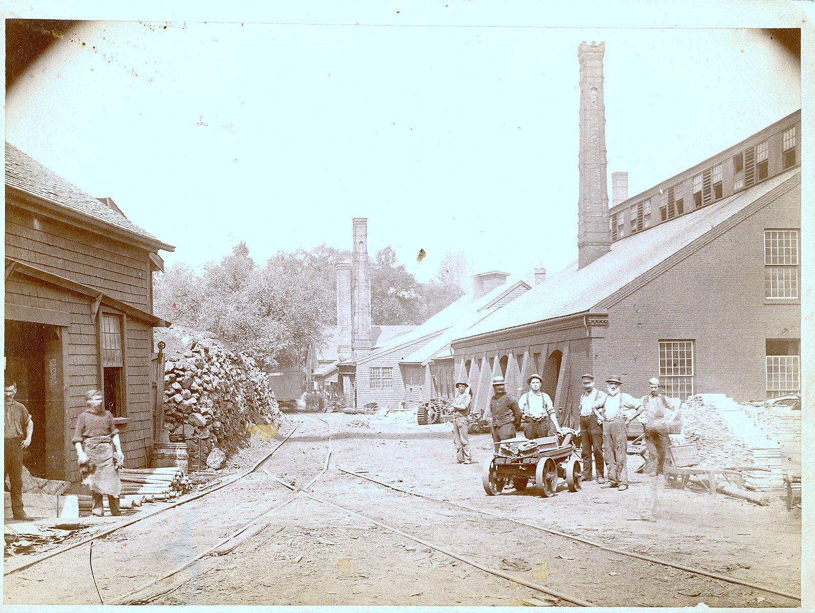 This photo, circa 1880, shows men working at the copper mill started by Paul Revere in 1801. The building on the right is the mill built by Revere's son, which is now being restored.