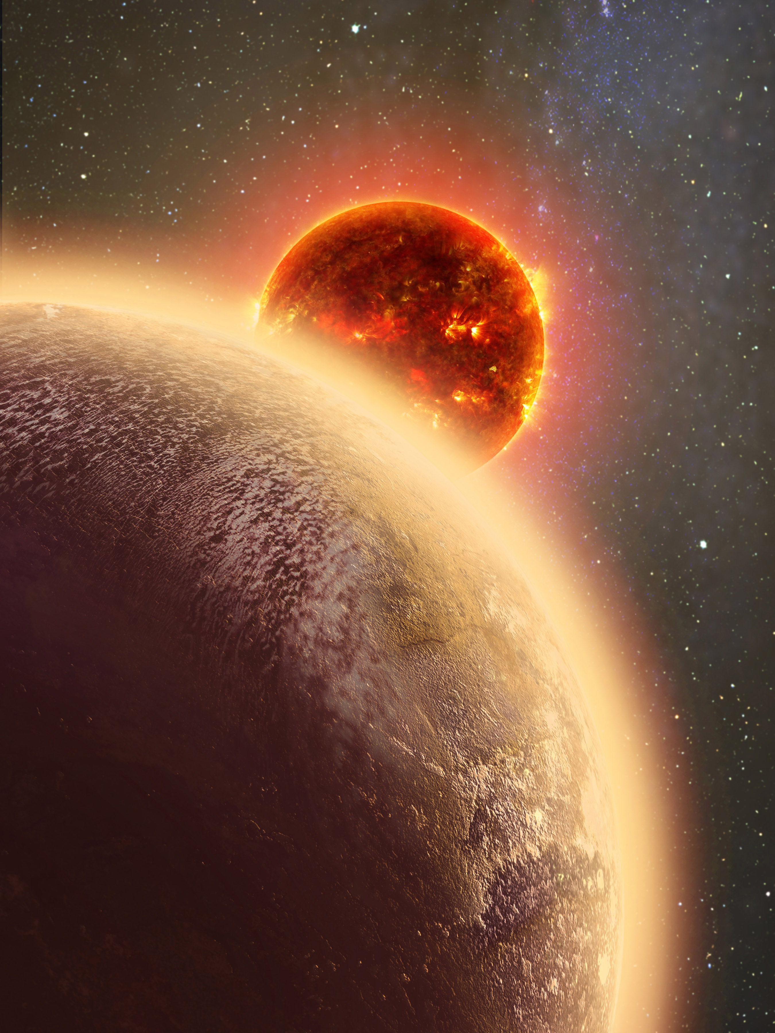 An artist’s conception provided by NASA shows GJ 1132b (foreground), a rocky planet similar to the Earth in size and mass, orbiting a red dwarf star.