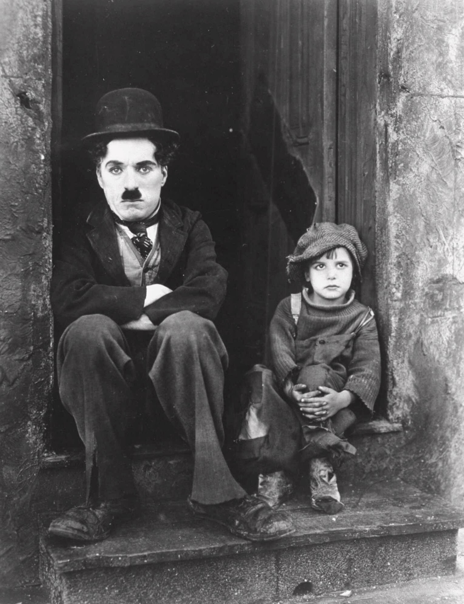 A still from Charlie Chaplin’s 1921 film, “The Kid,” with Jackie Coogan.