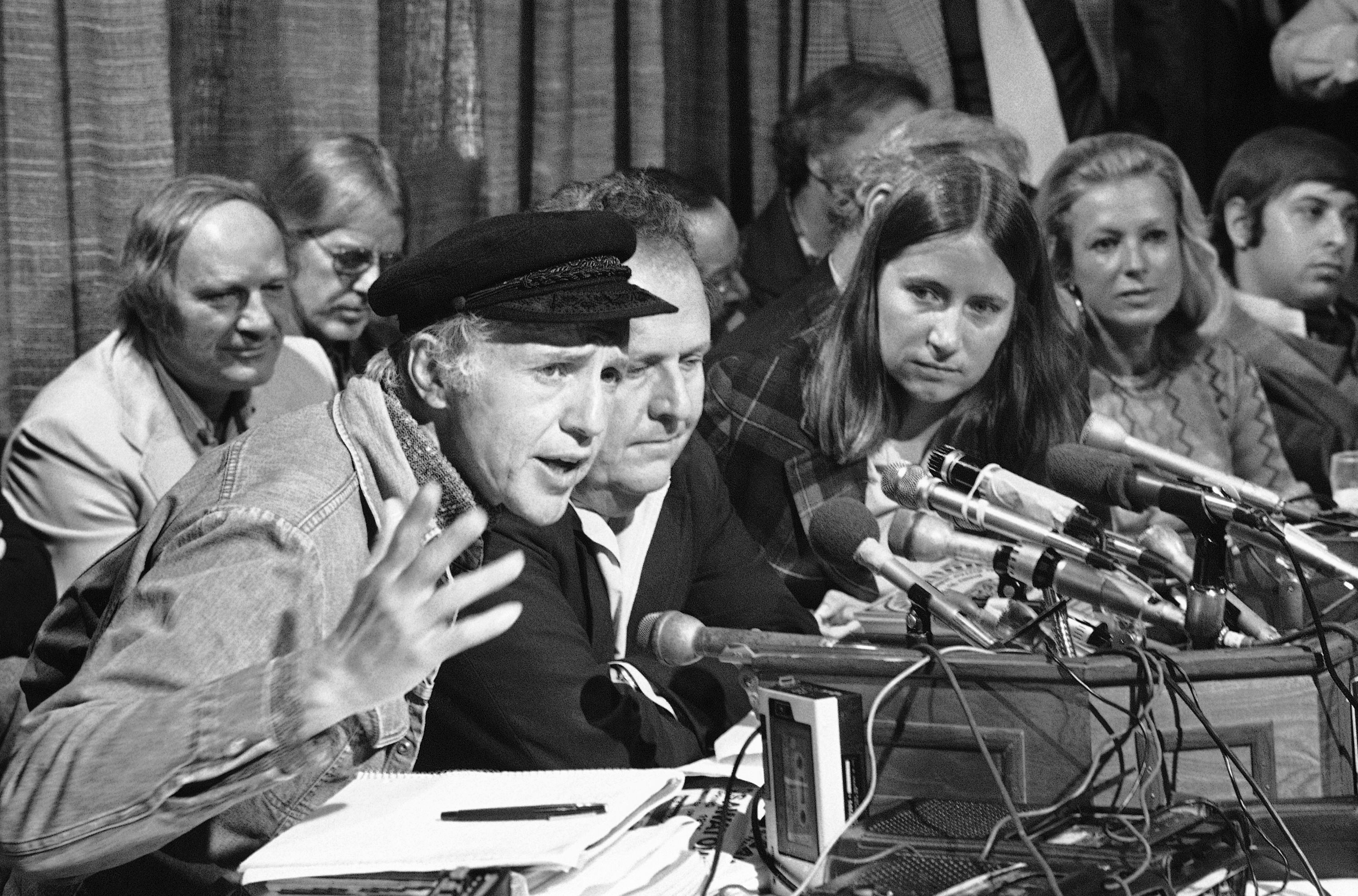 Filmmakers Haskell Wexler, left, Emile de Antonio, and Mary Lampson told a Los Angeles news conference in June 1975 that they would not cooperate with a federal grand jury in connection with a film they are making on the Weather Underground Organization. They said they were determined to complete the film which they describe as a dialogue with the fugitive group.
