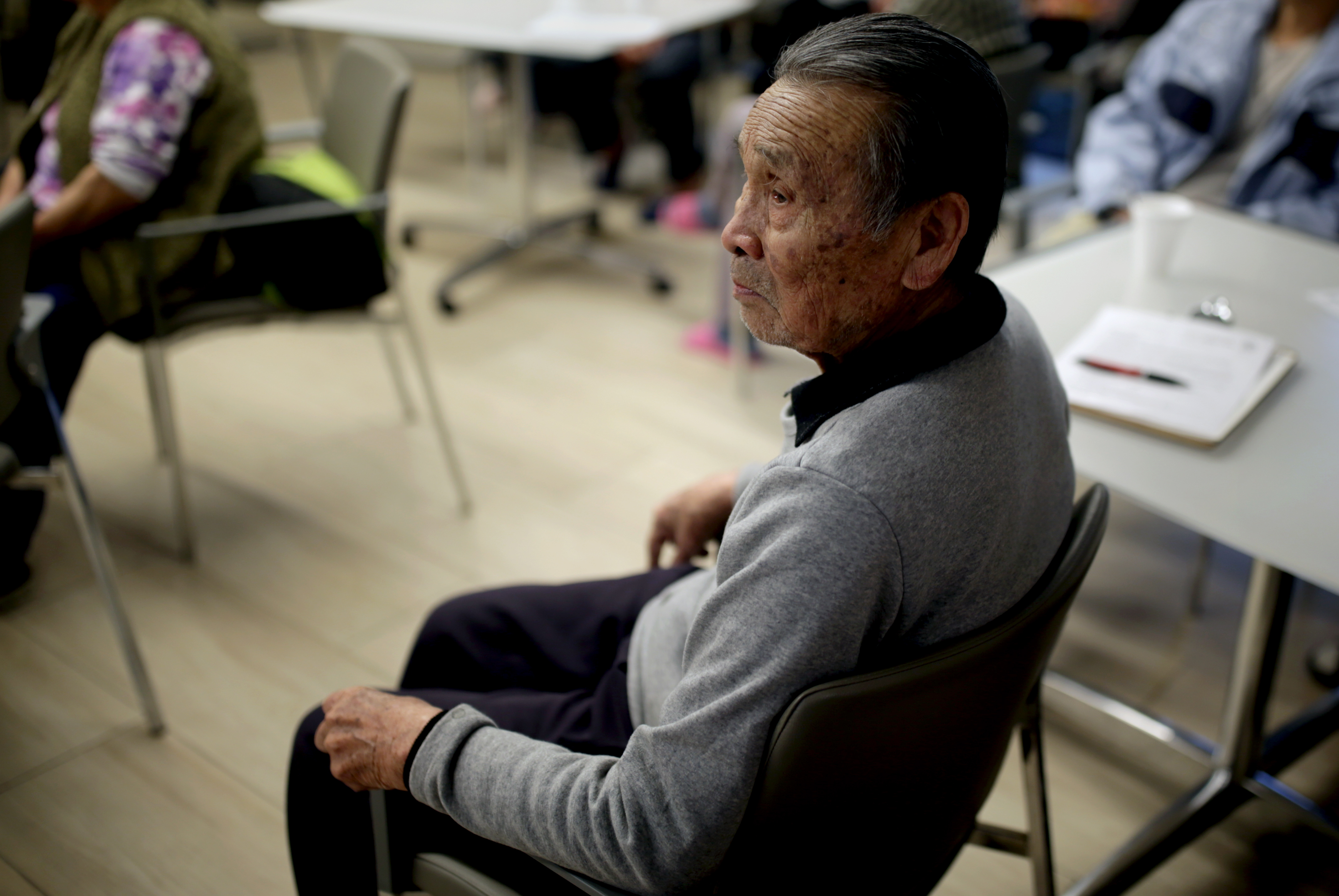 Shou Qiang Mei was at Quincy Tower in Chinatown on Tuesday for a meeting to discuss concerns about the coronavirus and stem misinformation.