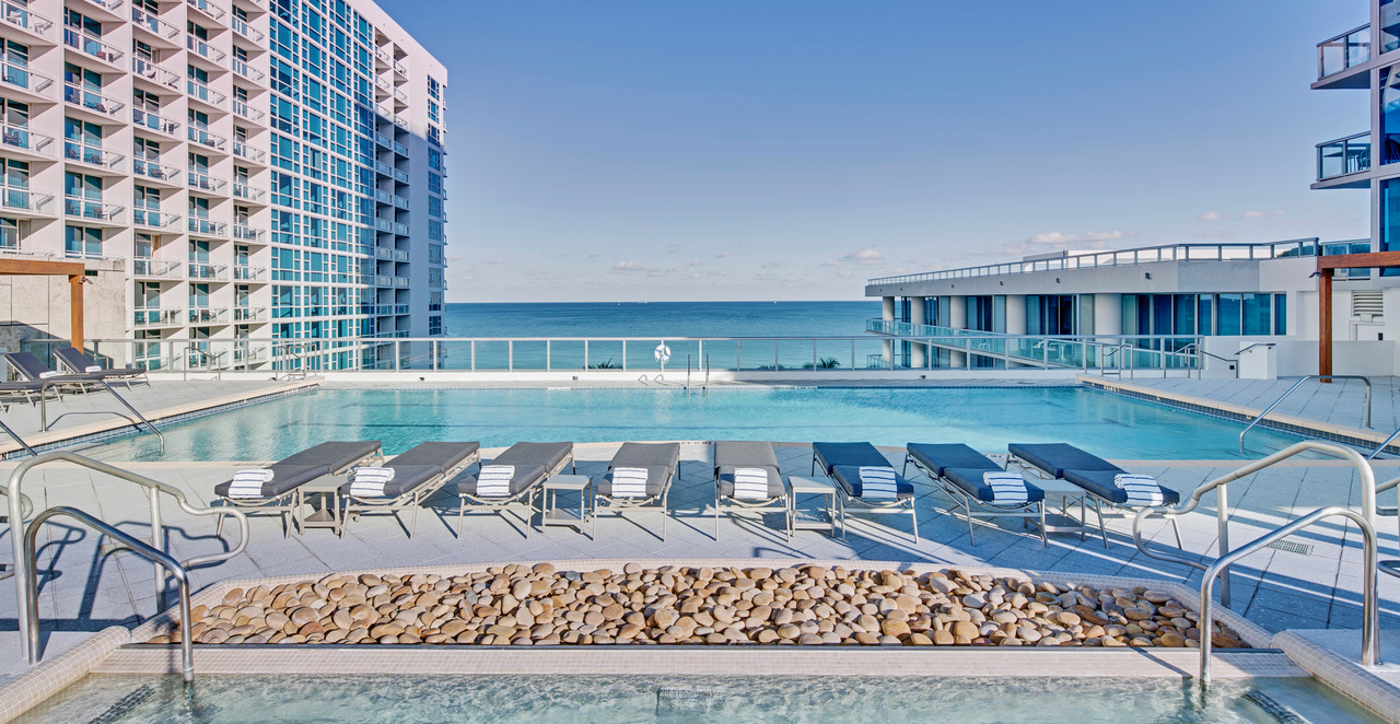Plan a spa day or treatment at the Carillon Miami Wellness Resort, and enjoy the facilities — including this infinity-edge pool.