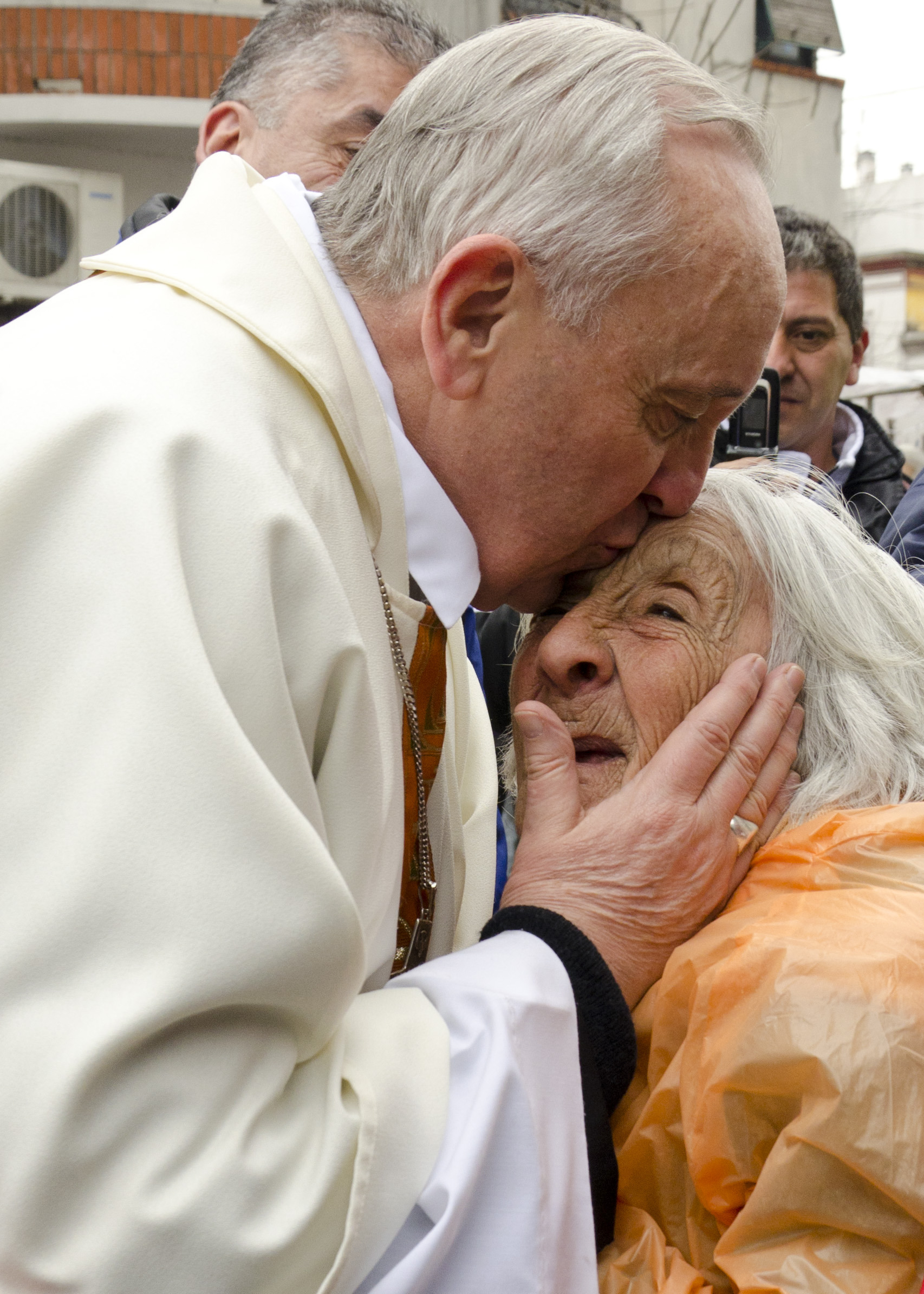Then-Cardinal Jorge Mario Bergoglio greets the faithful after celebrating mass in 2012 in Buenos Aires, Argentina.