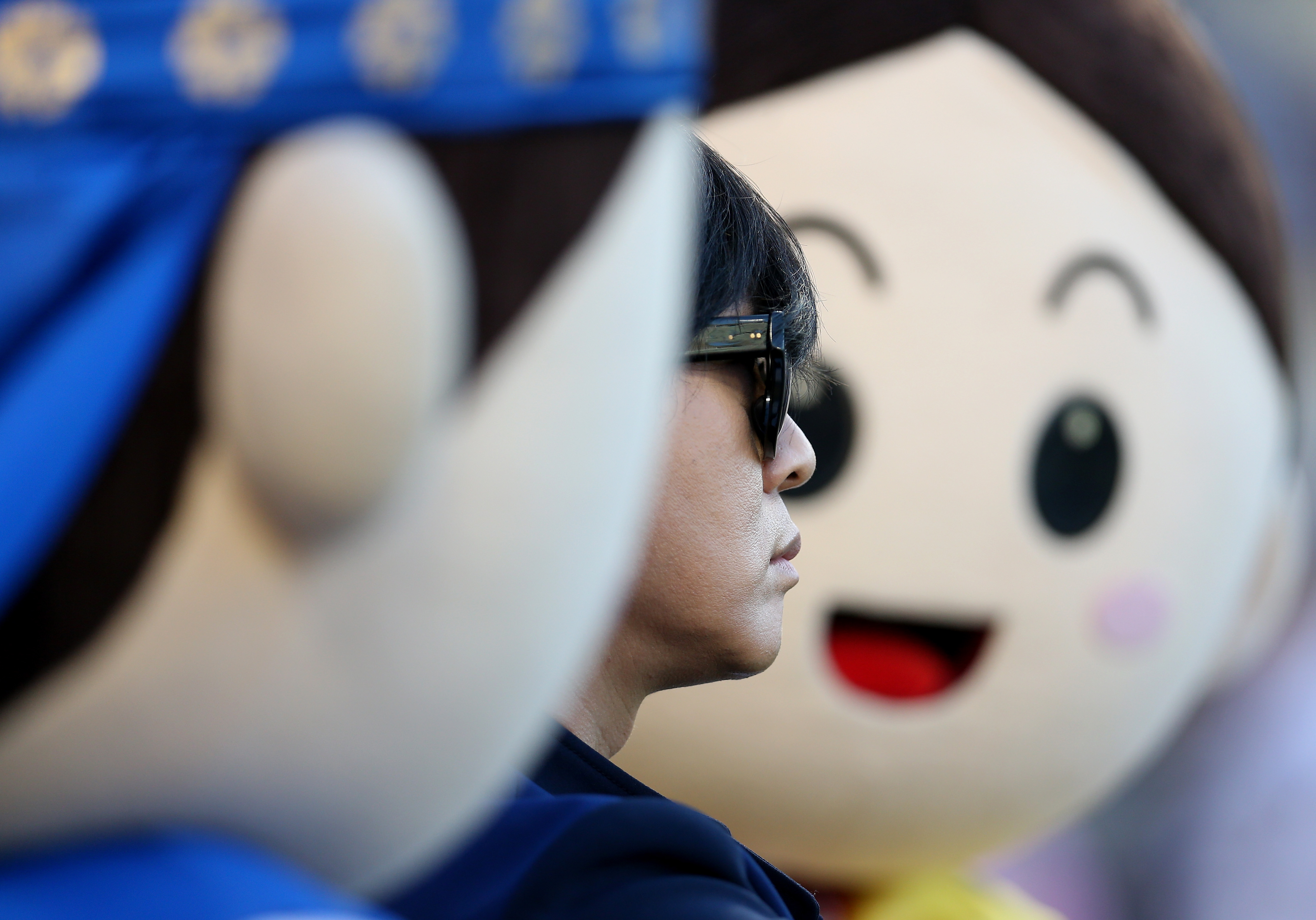 SOUTH KOREA: Pop star Yoon Do-Hyun prepared to sing the US national anthem as part of a Korea Night promotion during a Rangers-Dodgers game at Dodger Stadium on June 17 in Los Angeles.