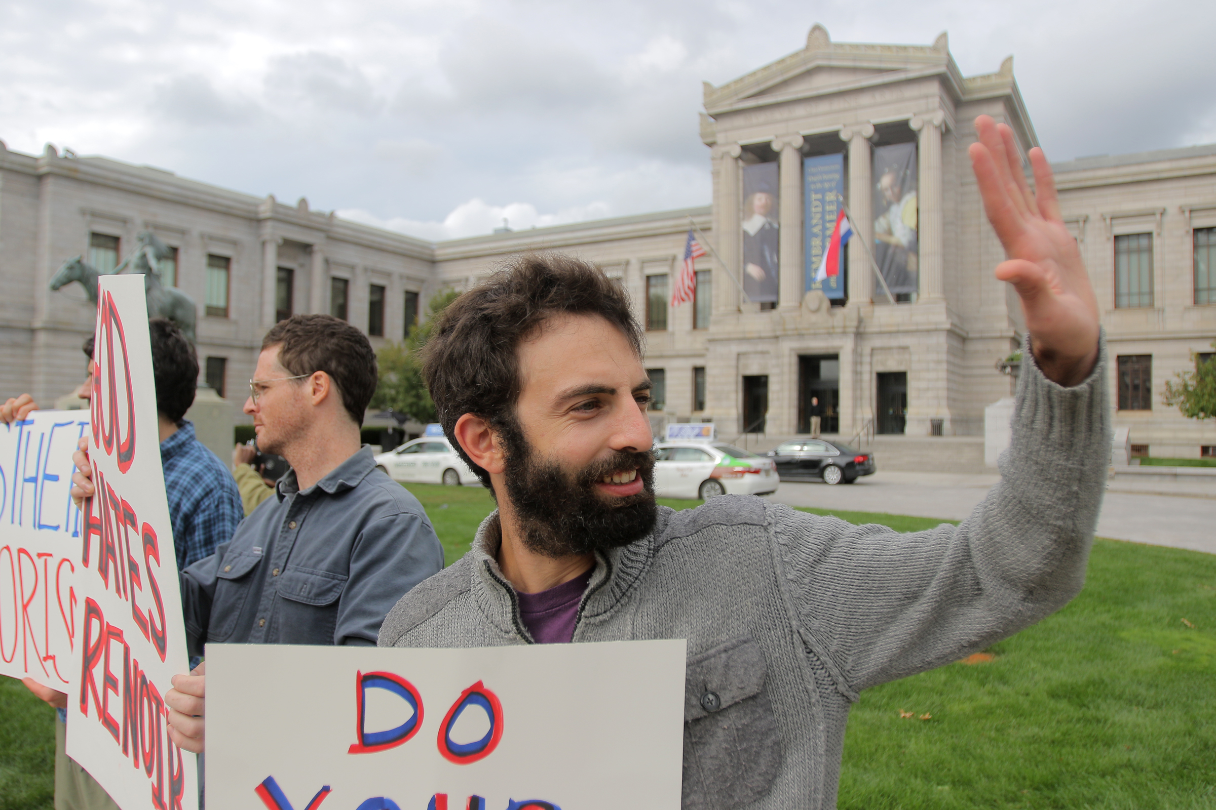 Max Geller (foreground) and other protesters outside the Museum of Fine Arts.