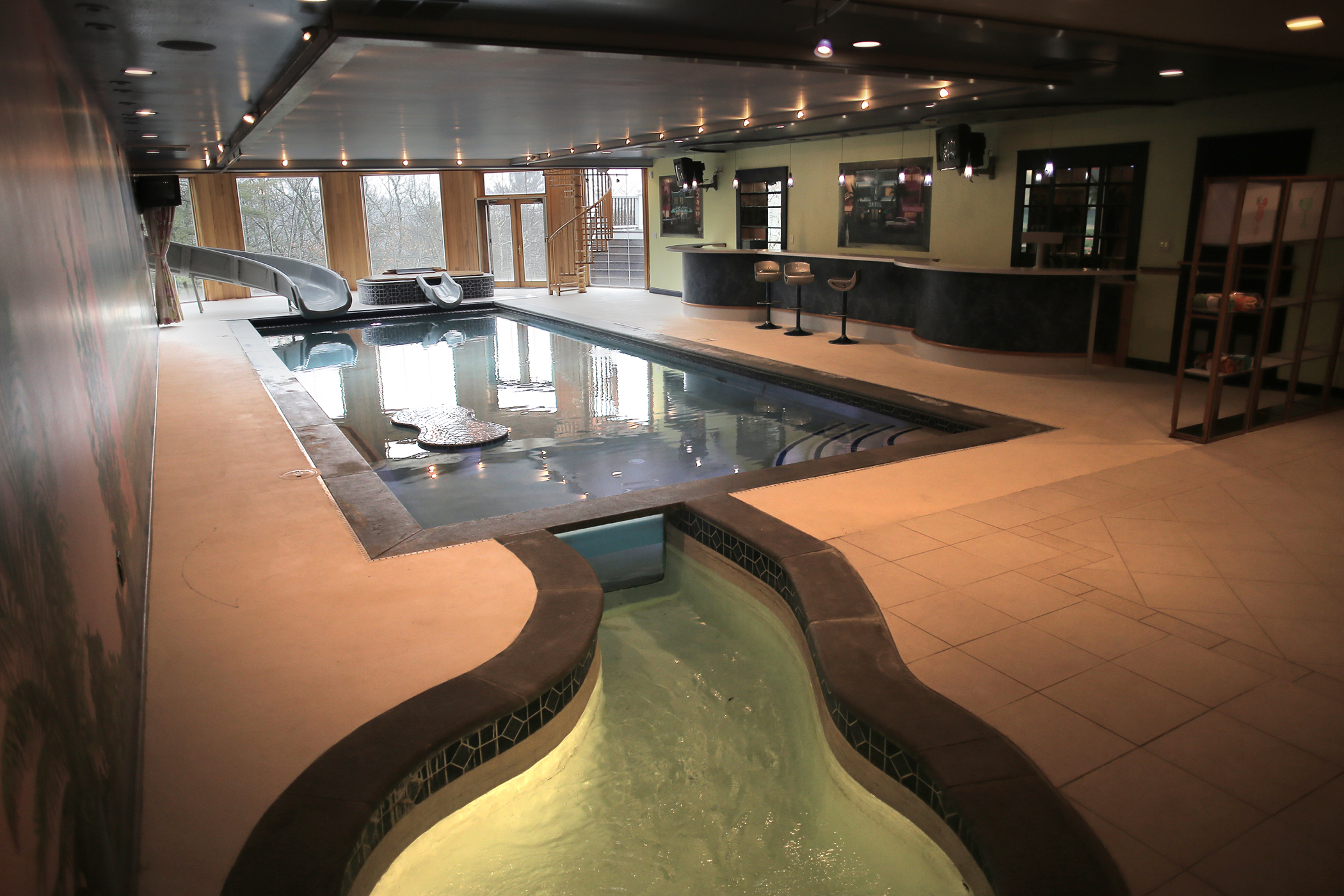 The slide empties into the pool.