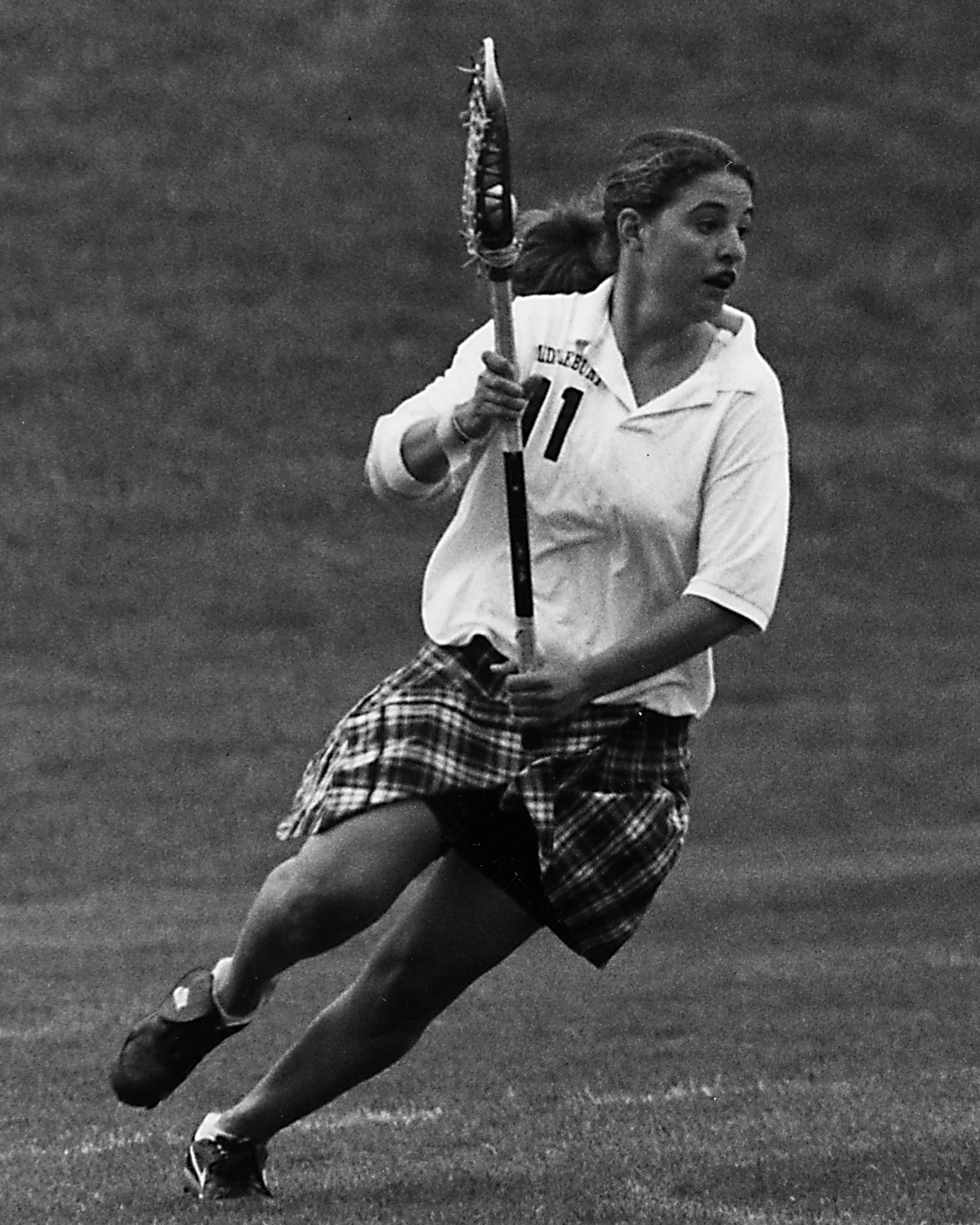 Amy DiAdamo Foster played lacrosse for Middlebury College, where she led the team to a national championship in 1997. She set records at the school that still stand.