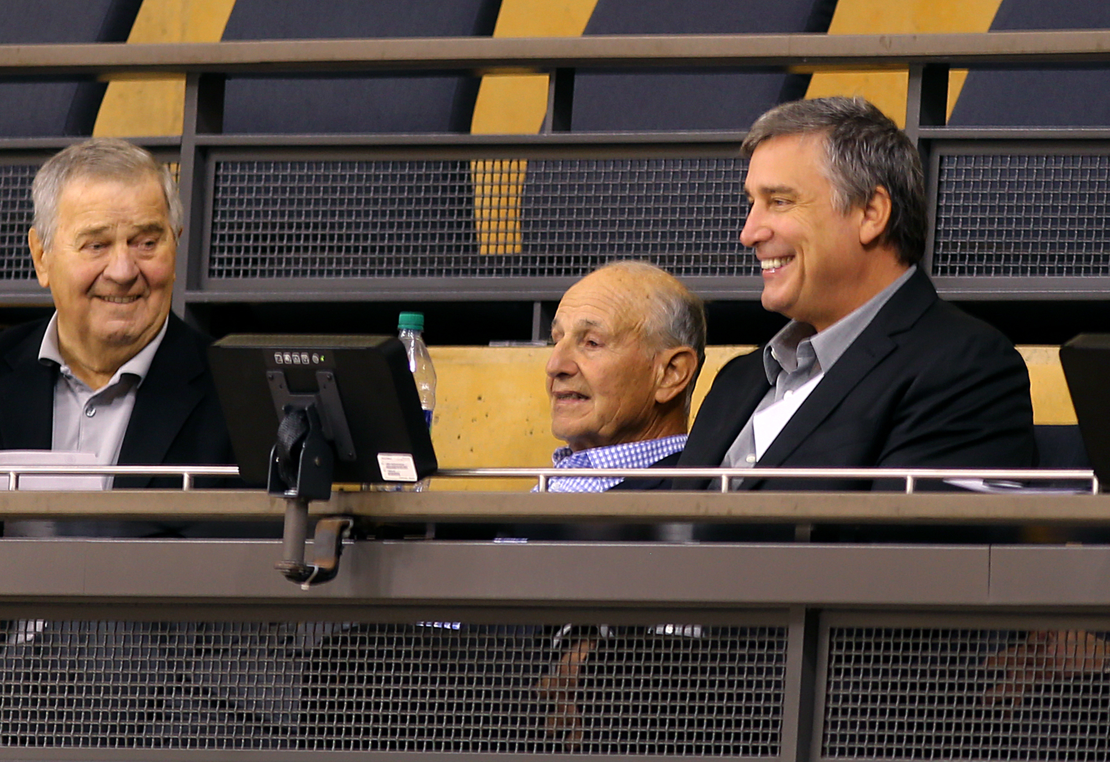 Harry Sinden sits with Jeremy Jacobs Cam Neely during a 2015 practice.