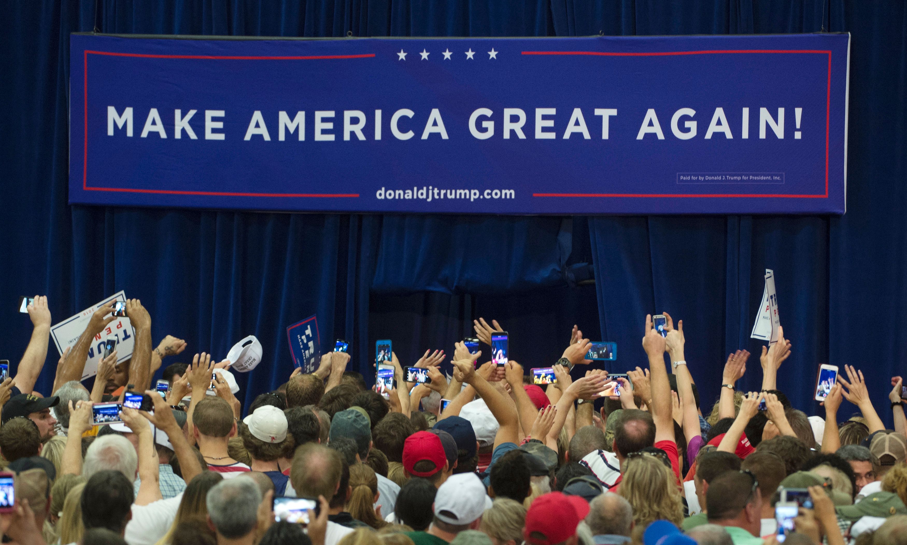 Supporters tried to get a glimpse of Trump as he left Sunday’s rally in Virginia.