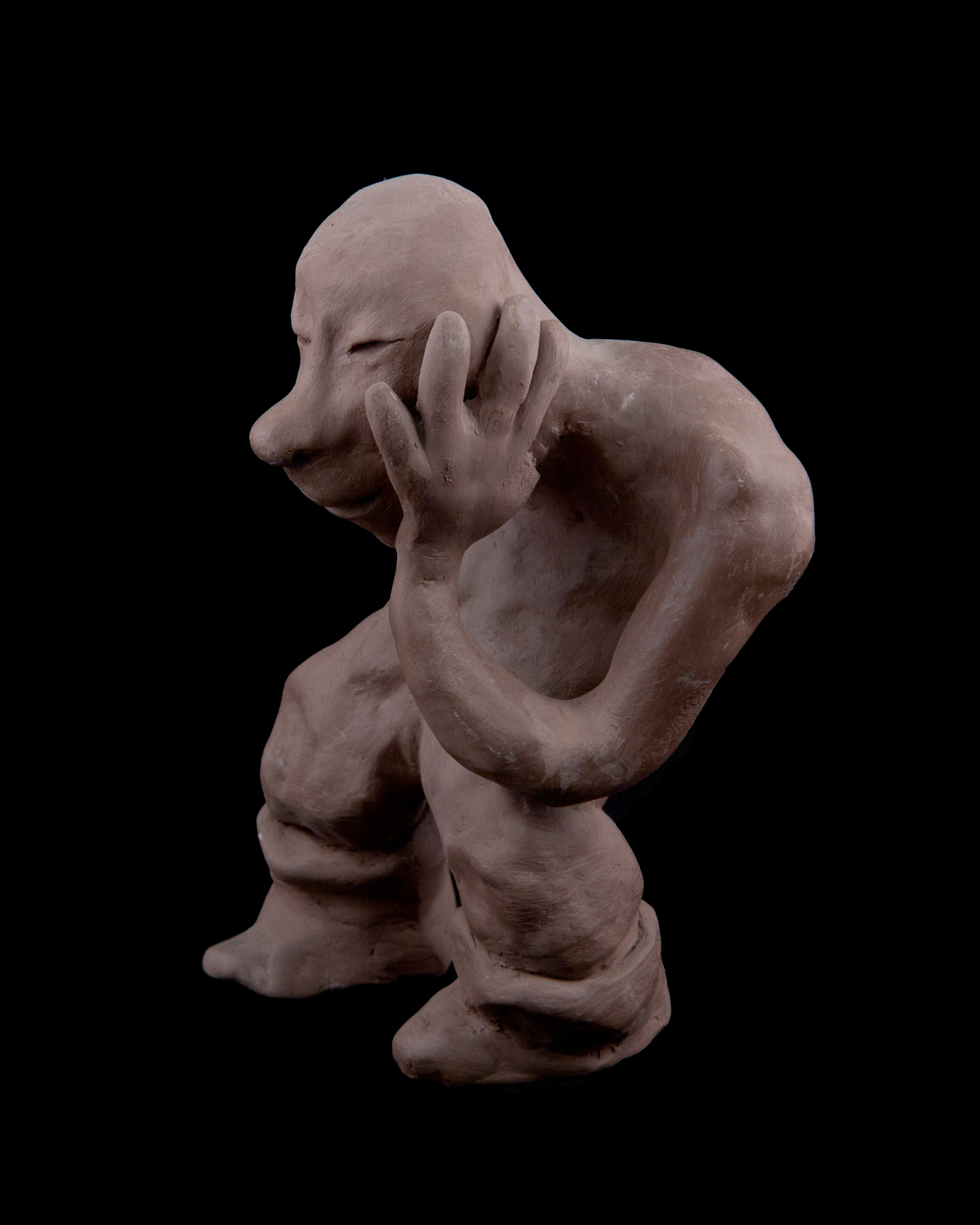 Clay thinking man.