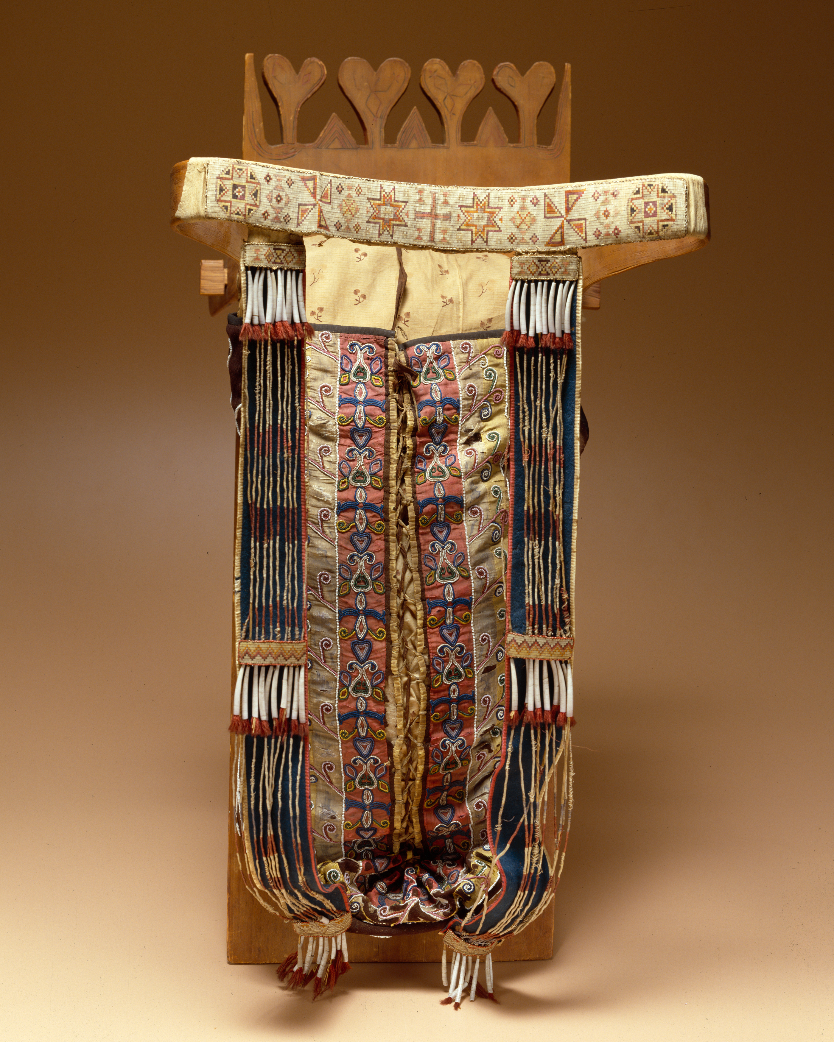 A baby carrier from about 1835 is part of the collection at issue.