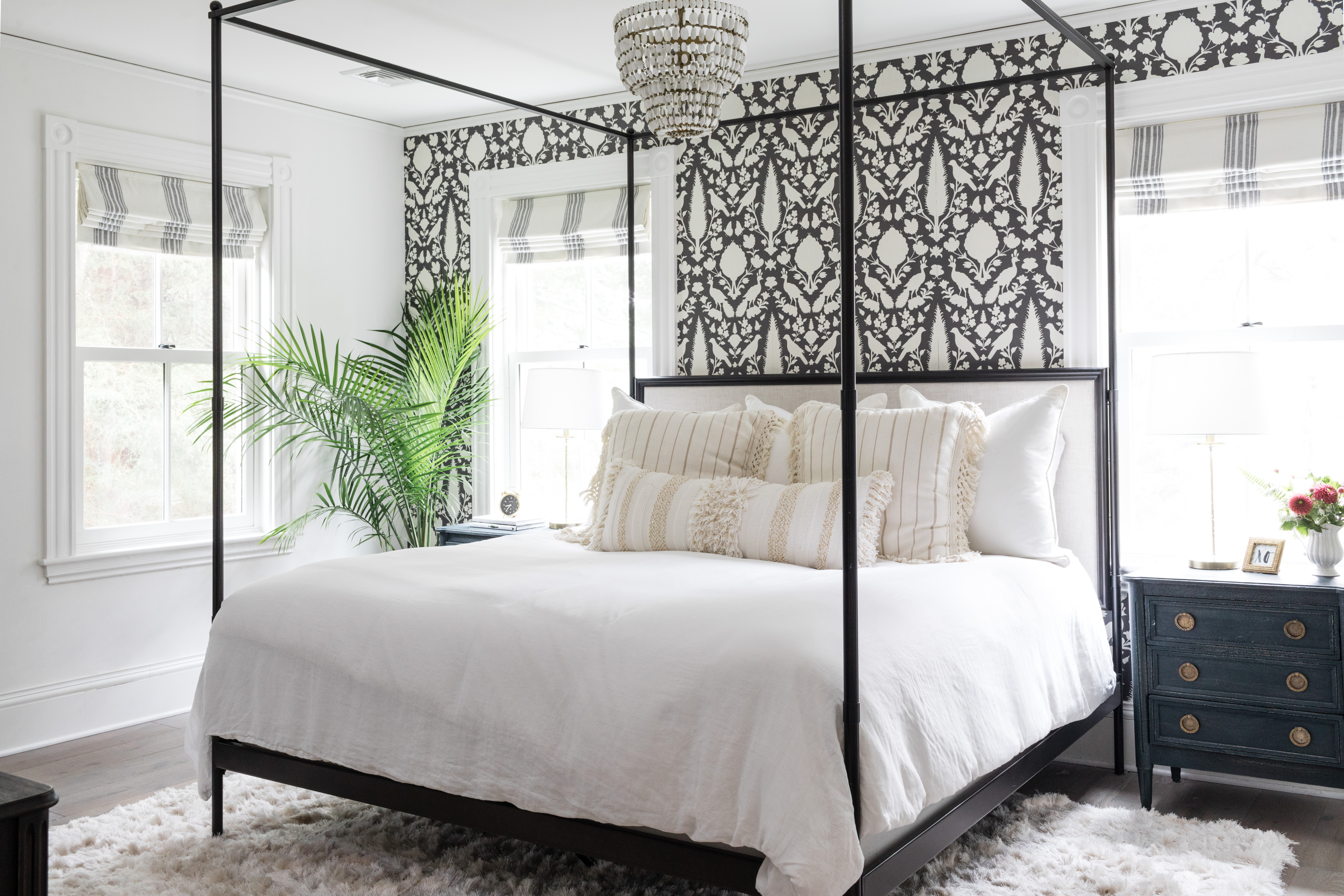 Schumacher wallpaper jazzes up the master bedroom.