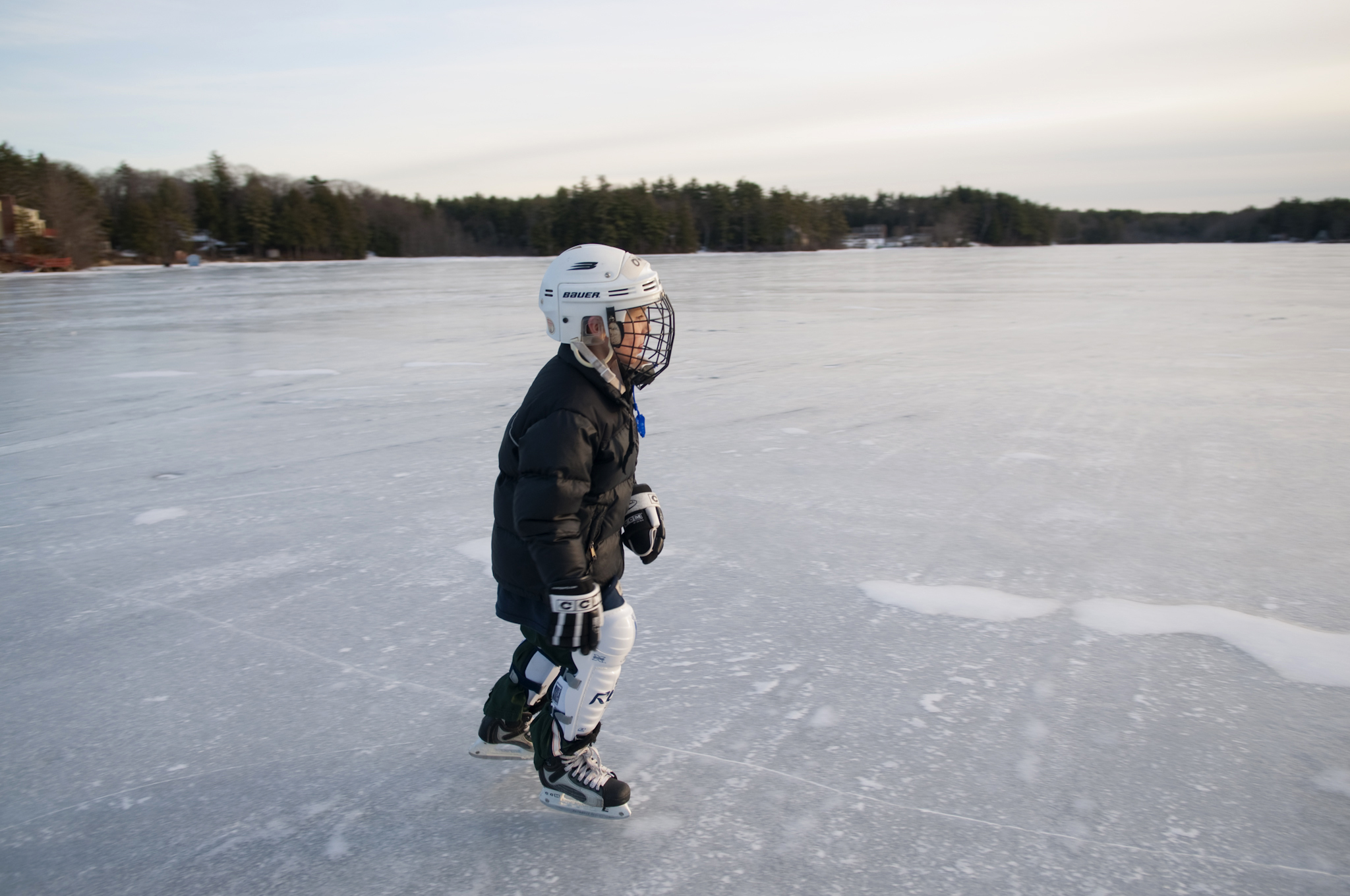 Reese Bower, author Jay Atkinson’s nephew, wears a helmet and other hockey gear to protect against falls.
