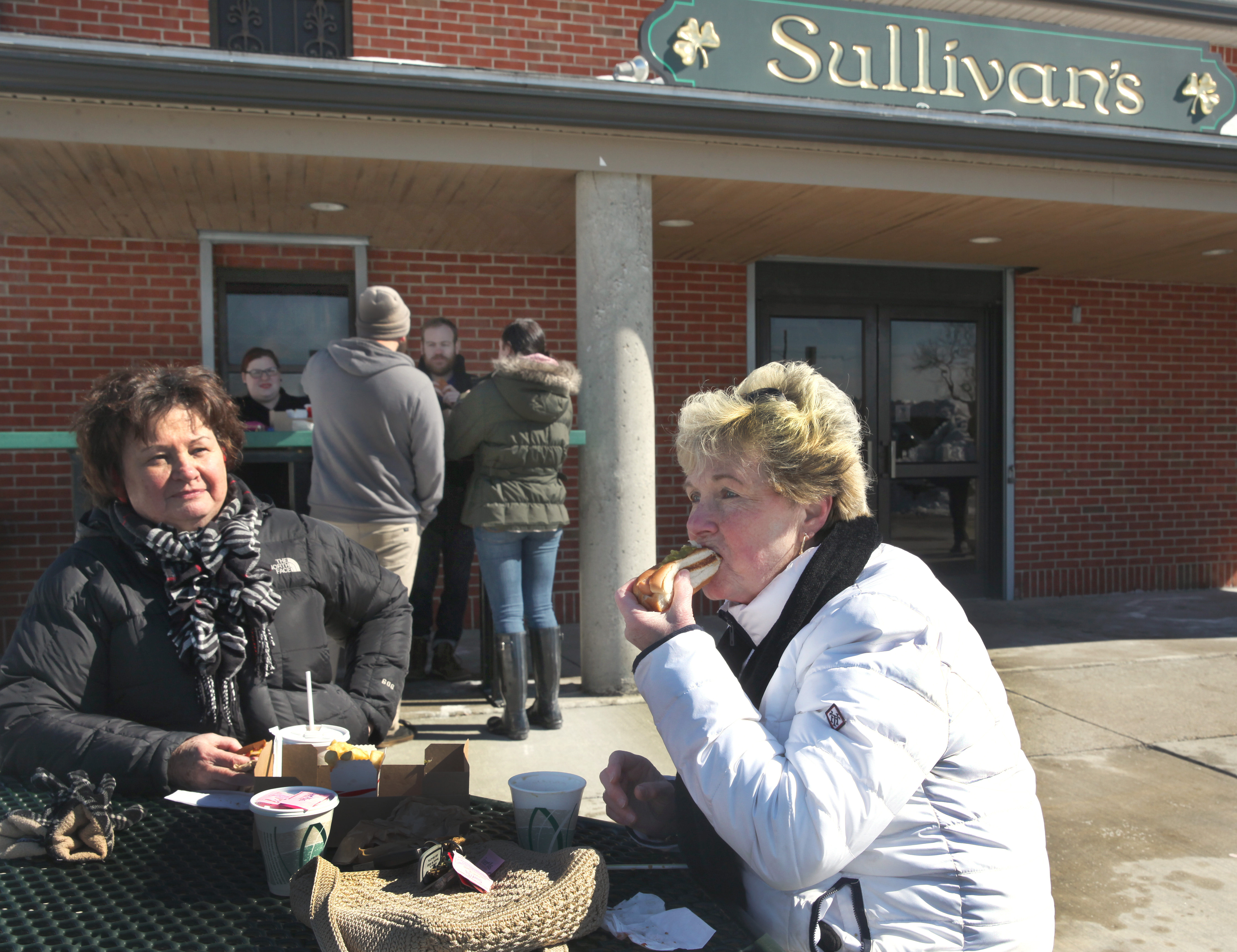 Ellen Shultz and Doris Rooney ate hot dogs at Sullivan’s in South Boston in February 2015.