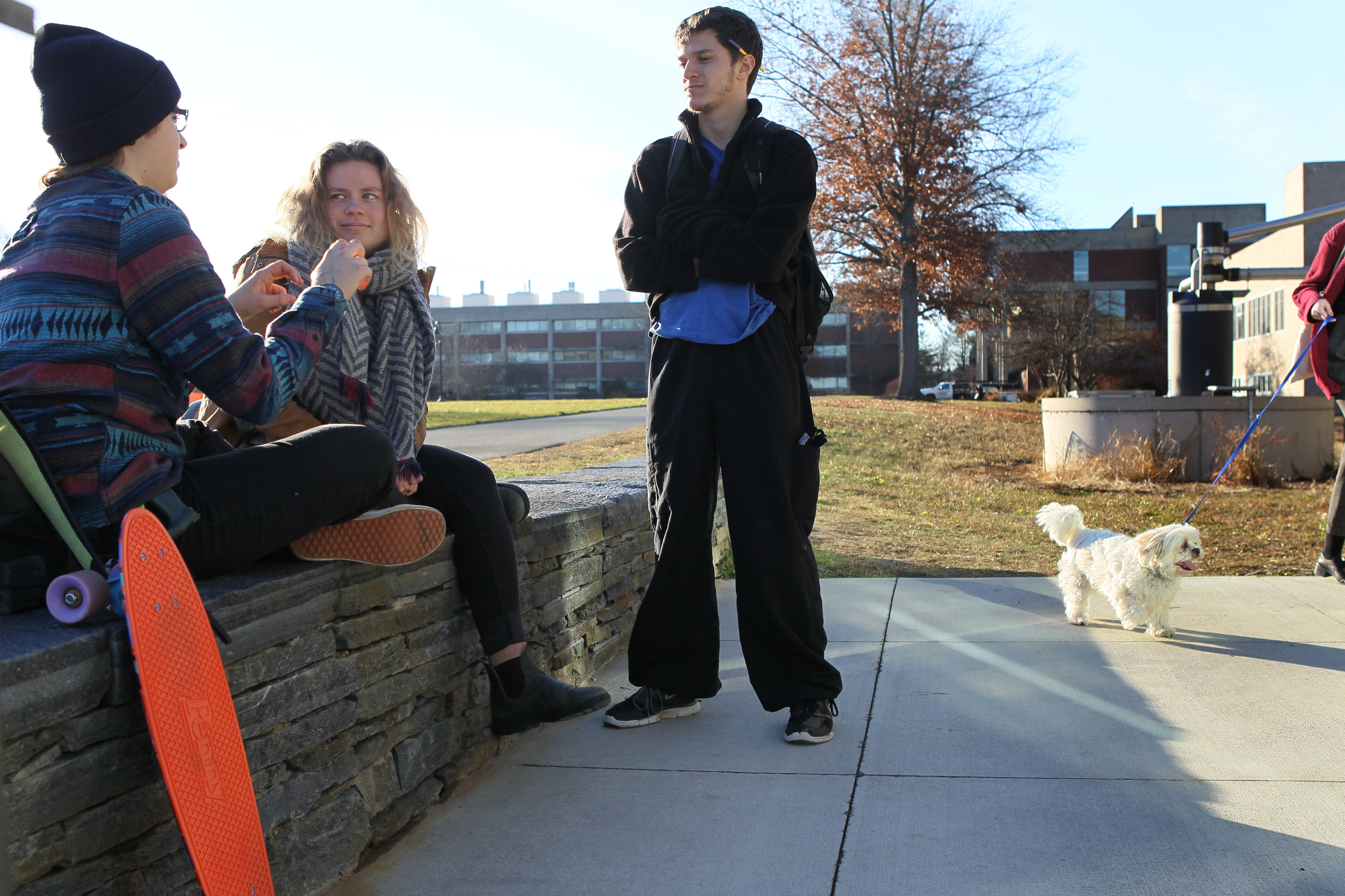 Students (from left) Emory Ellis of Louisiana, Astrid Tilton of Martha's Vineyard, and Daniel Van Note of Colorado talked about the flag controversy.